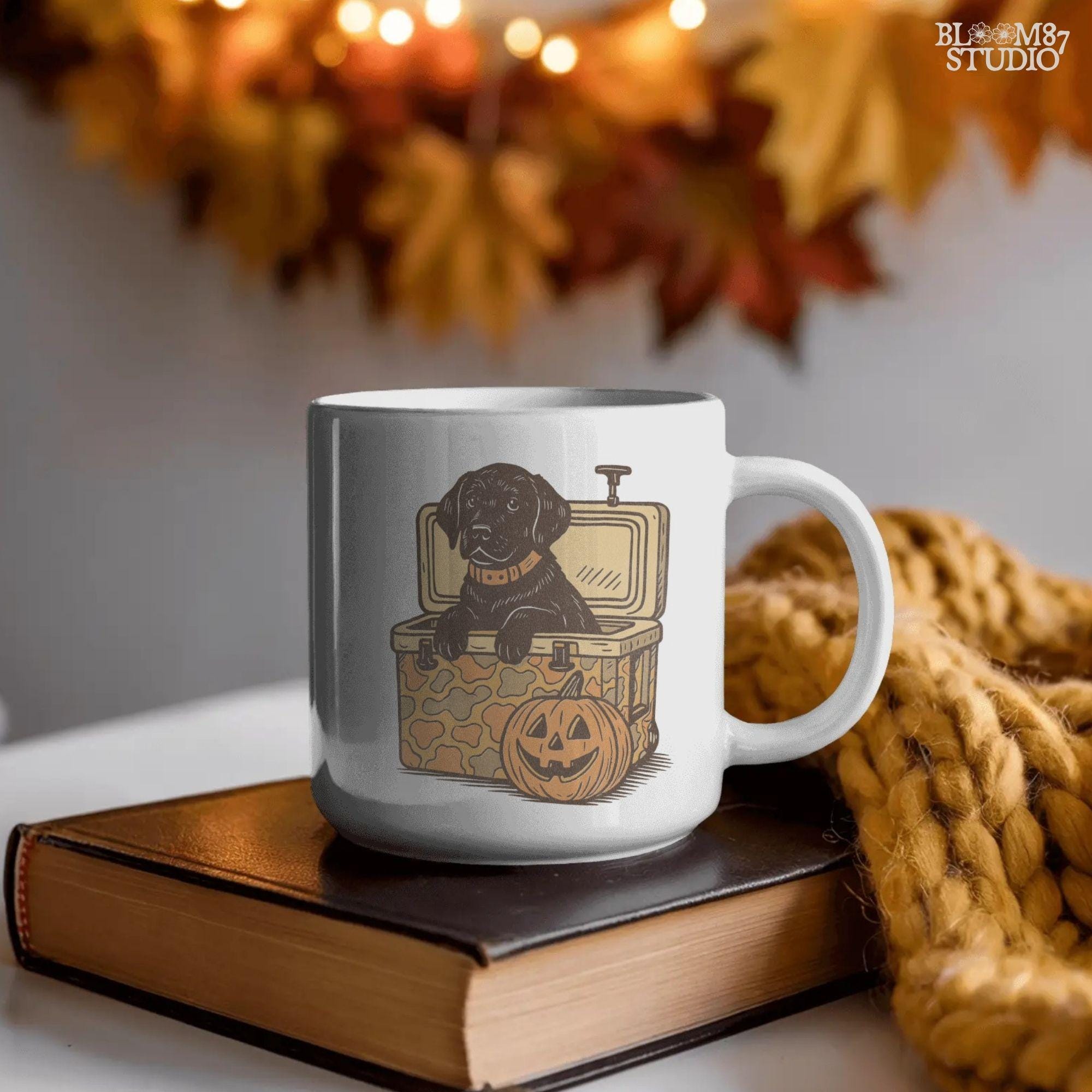Black Labrador retriever sitting in a cooler with a pumpkin, Halloween sublimation PNG design for dog lovers, seasonal crafts, and apparel.