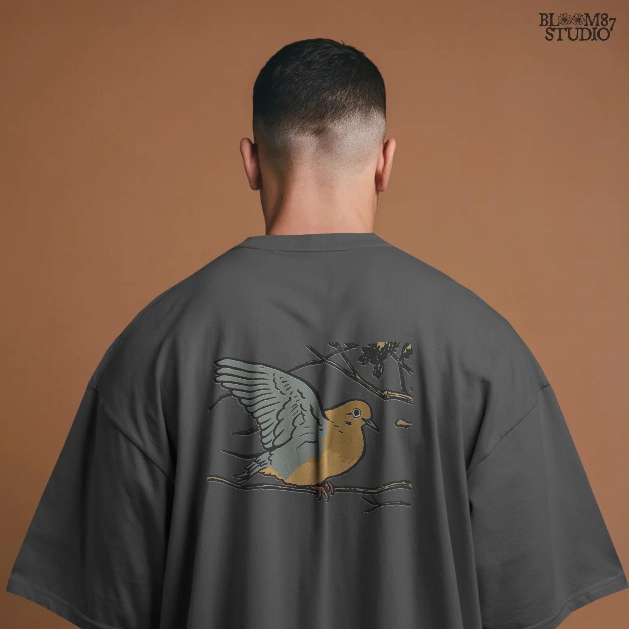 Rustic sublimation PNG of a mourning dove perched on a tree branch, ideal for hunting-themed or fall wildlife shirt designs.