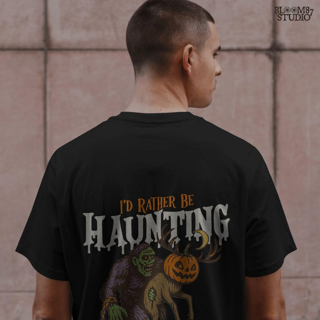 Humorous Halloween sublimation PNG featuring a zombie carrying a deer with a jack-o’-lantern head and the phrase “I’d Rather Be Haunting.”