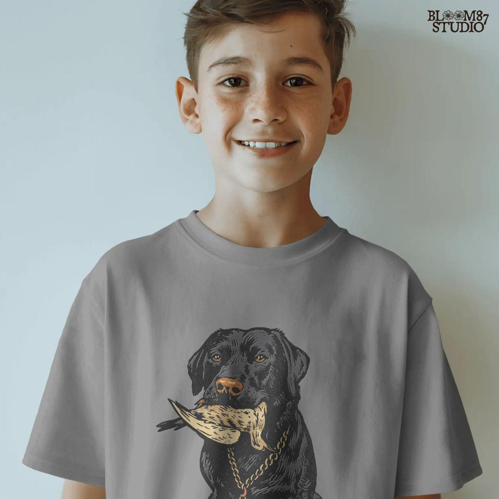 Black Labrador retriever sitting with a dove in its mouth, illustrated for dove hunting sublimation projects and bird dog gift designs.