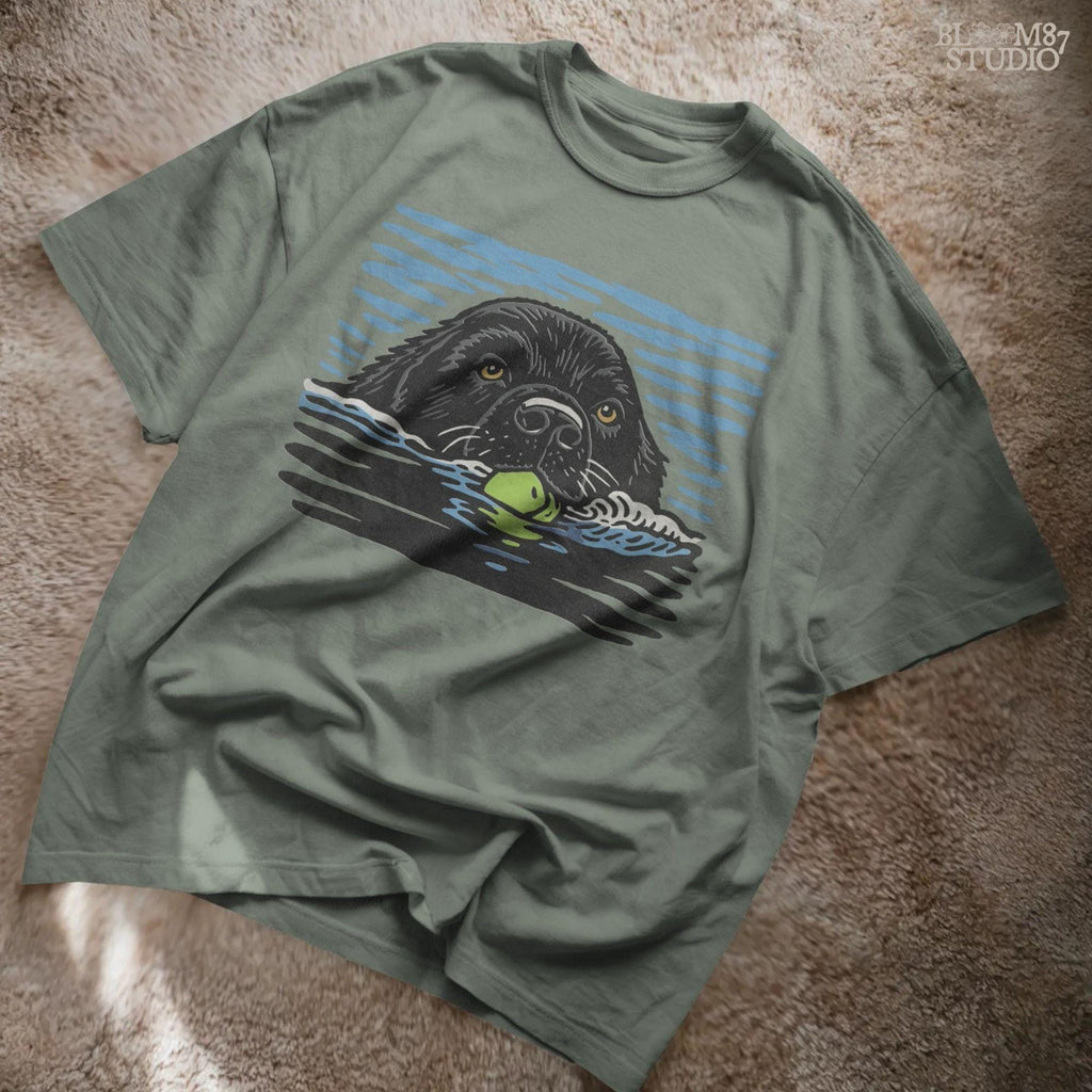 Black Labrador retriever swimming in water while holding a green tennis ball, drawn in vintage style for sublimation and dog lover projects.