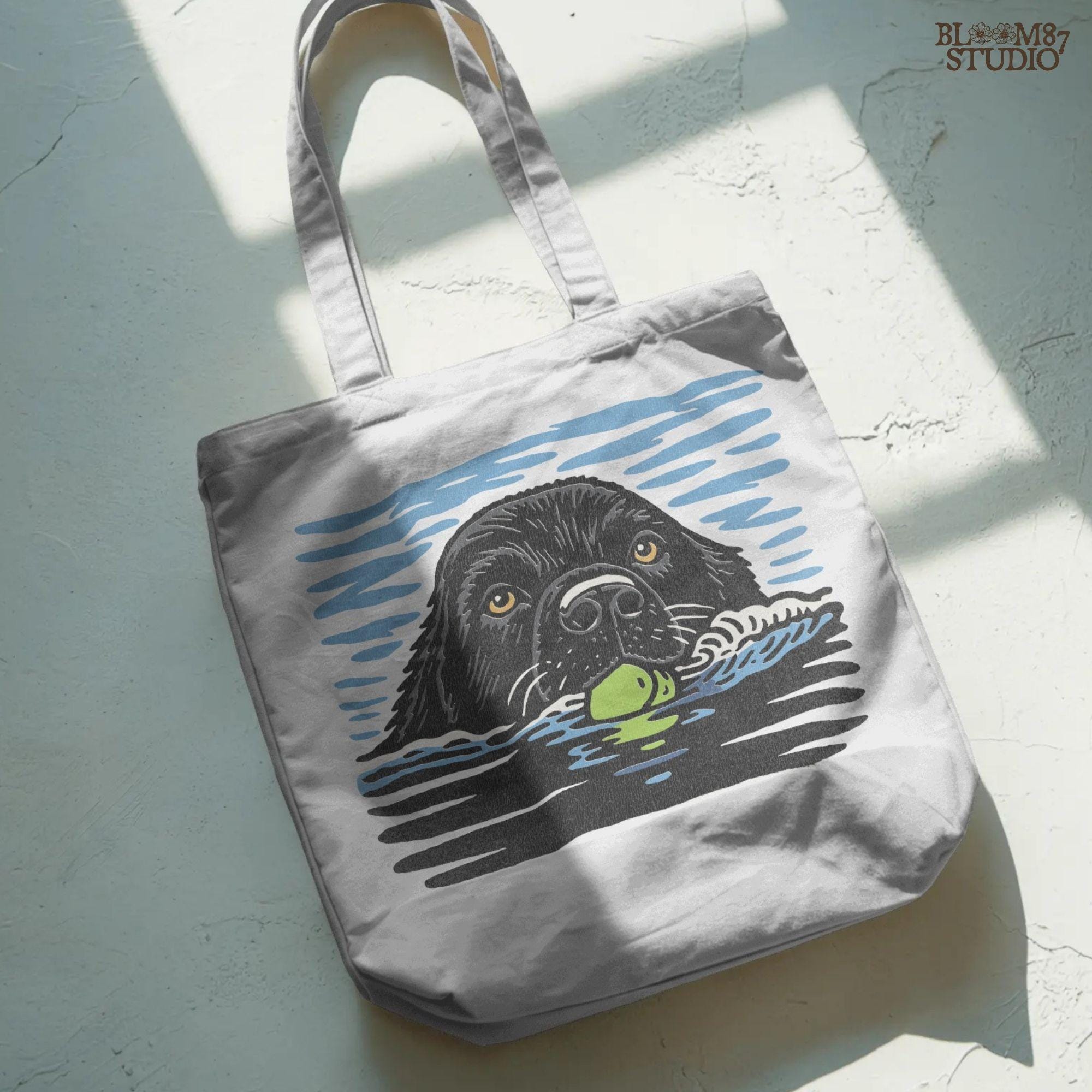 Black Labrador retriever swimming in water while holding a green tennis ball, drawn in vintage style for sublimation and dog lover projects.