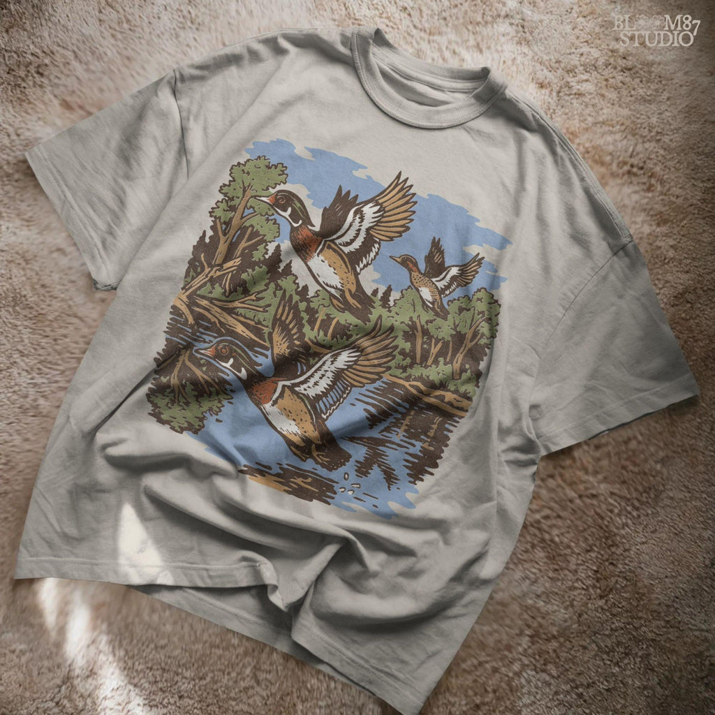 Vintage wood duck artwork showing ducks flying over a calm forest lake, perfect for fall hunting-themed sublimation designs and rustic crafts.