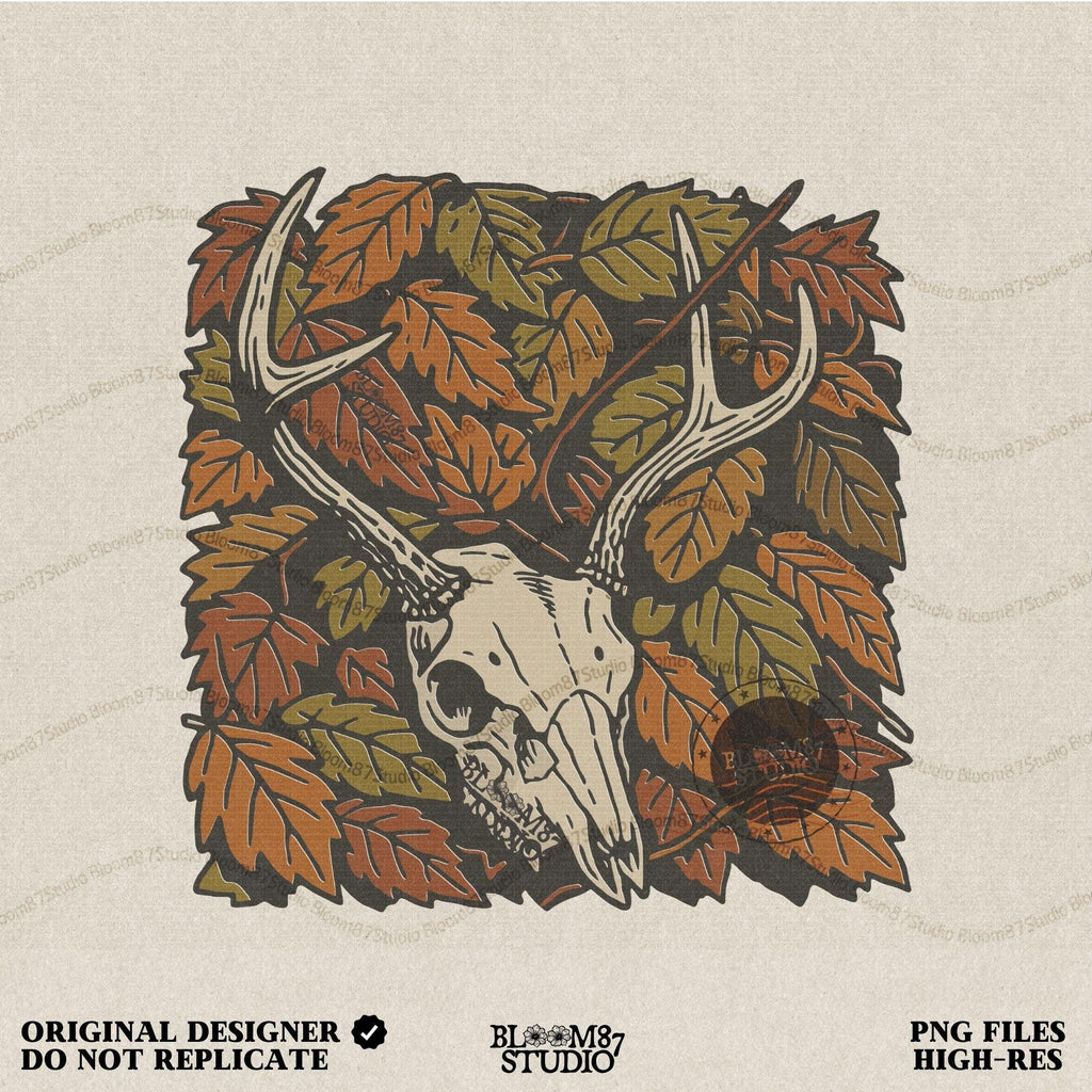 Deer skull with antlers surrounded by autumn leaves, rustic fall hunting sublimation PNG design.