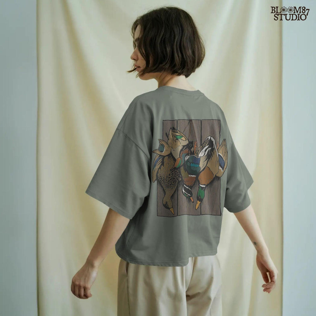 Realistic illustration of mallard drake and hen ducks hanging on rustic wooden planks, waterfowl hunting PNG sublimation design