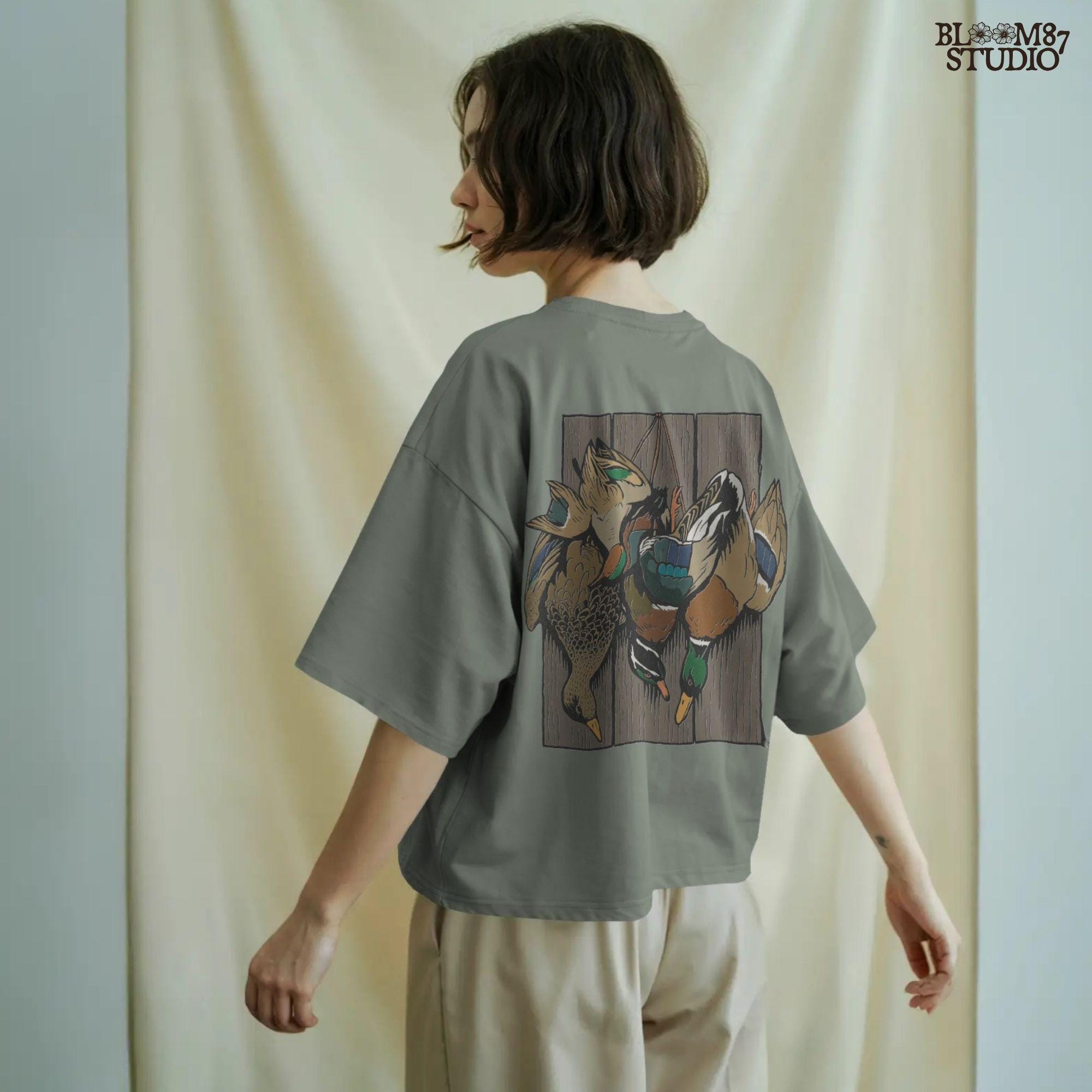 Realistic illustration of mallard drake and hen ducks hanging on rustic wooden planks, waterfowl hunting PNG sublimation design