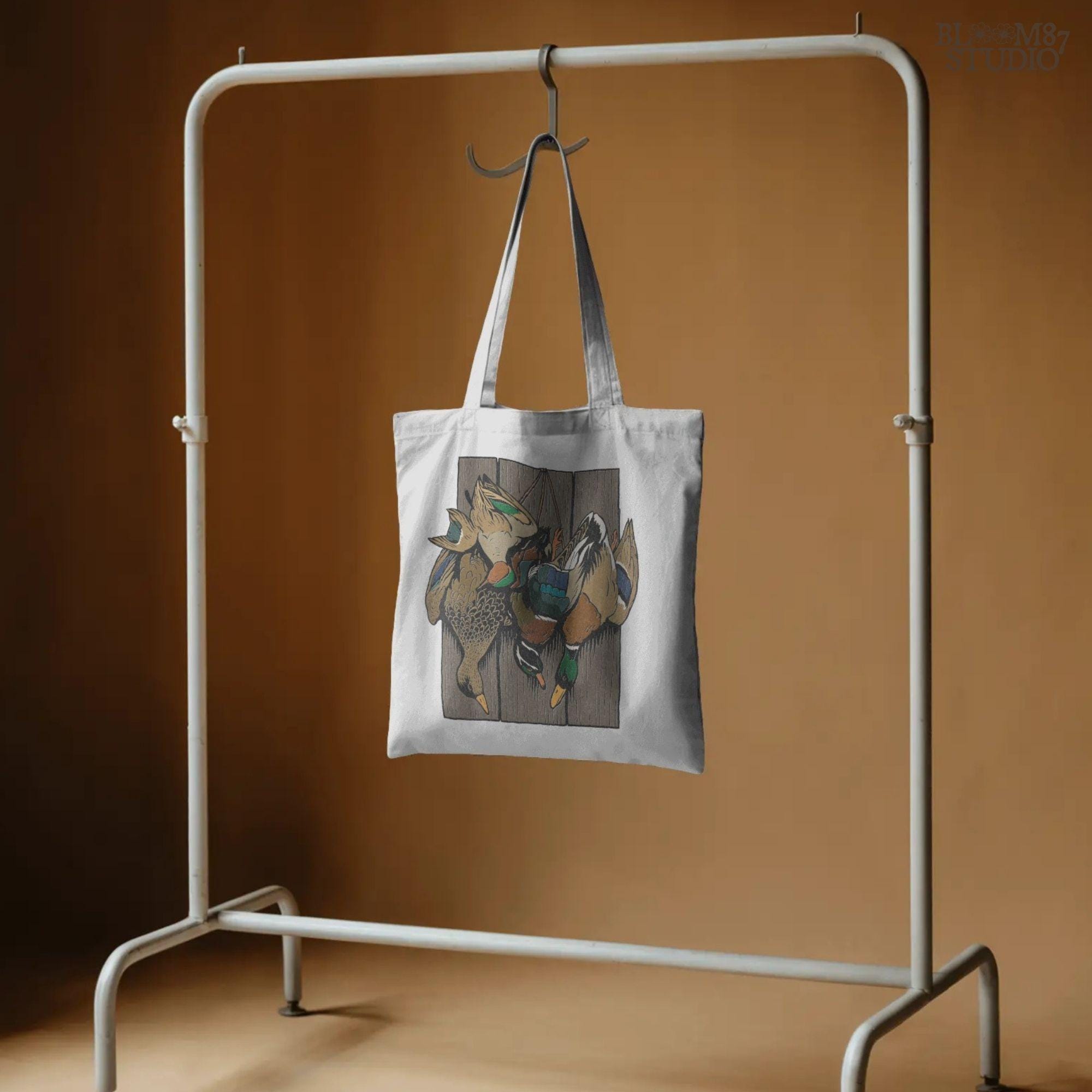 Realistic illustration of mallard drake and hen ducks hanging on rustic wooden planks, waterfowl hunting PNG sublimation design