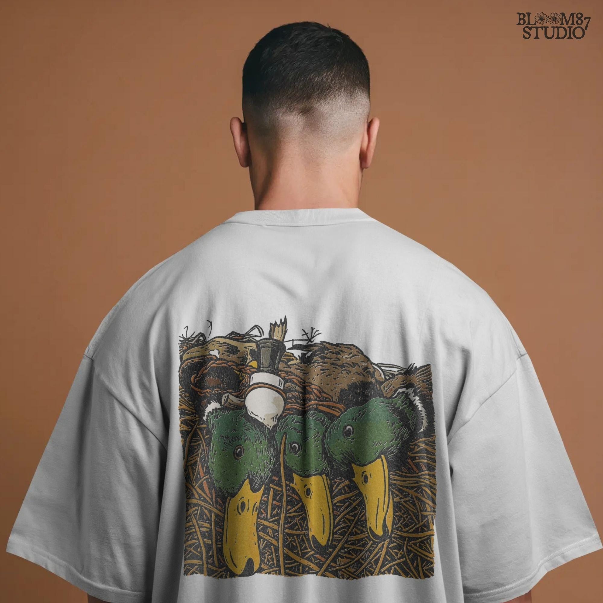 Illustration of three drake mallard ducks with green heads and yellow bills, lying in marsh grass with a duck call, hunting PNG sublimation design