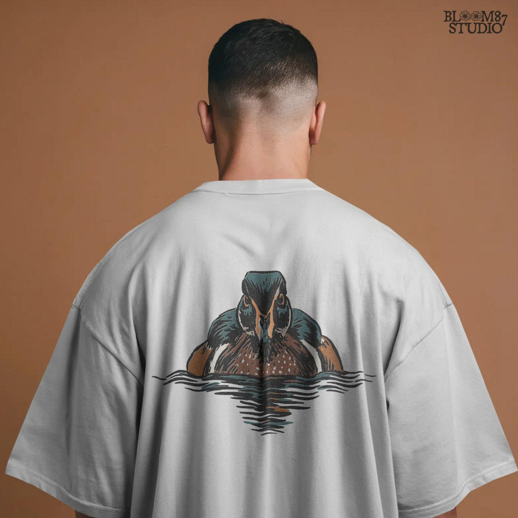 Illustration of a drake wood duck with chestnut, teal, and white plumage swimming on calm water, hunting-themed PNG sublimation design