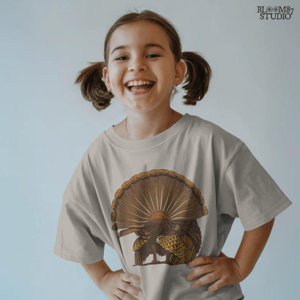 Illustration of a wild turkey from behind with fully fanned tail feathers in brown and golden tones, digital PNG for hunting and Thanksgiving crafts