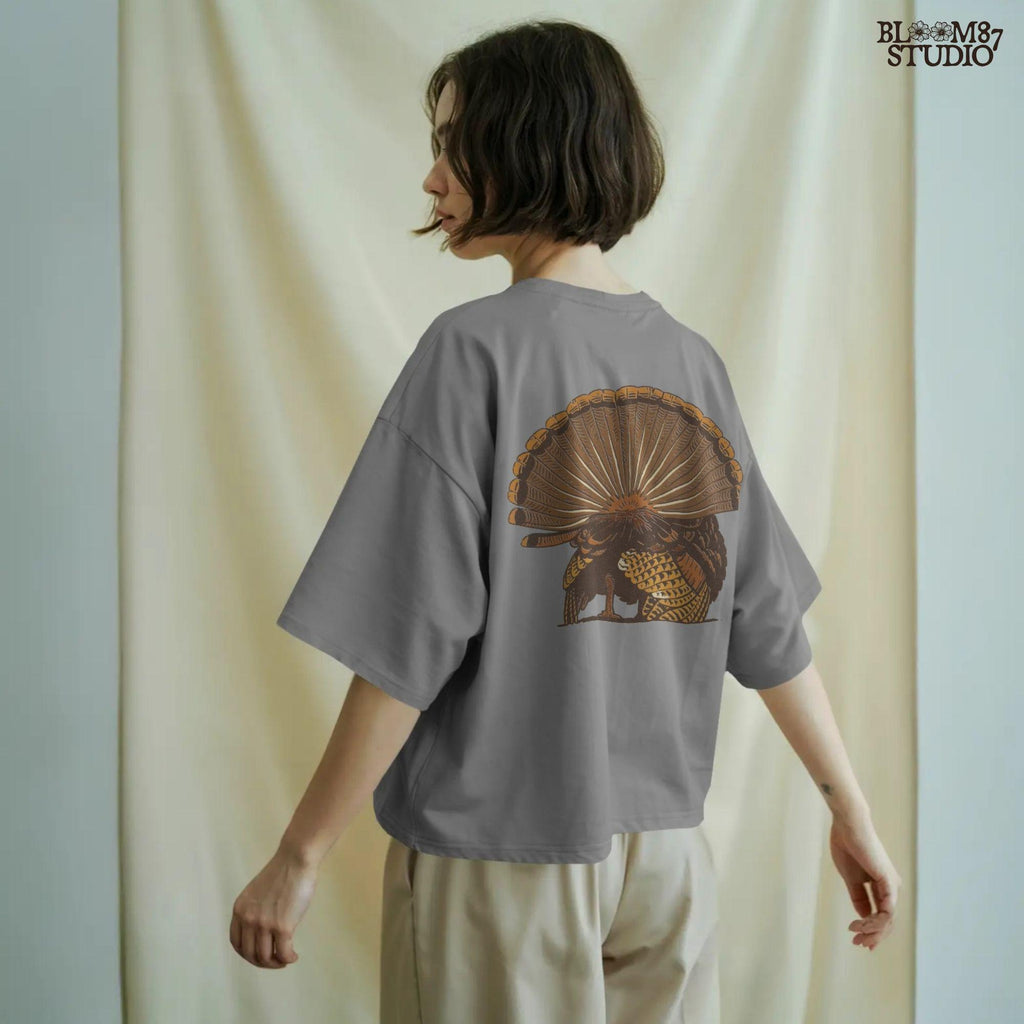 Illustration of a wild turkey from behind with fully fanned tail feathers in brown and golden tones, digital PNG for hunting and Thanksgiving crafts