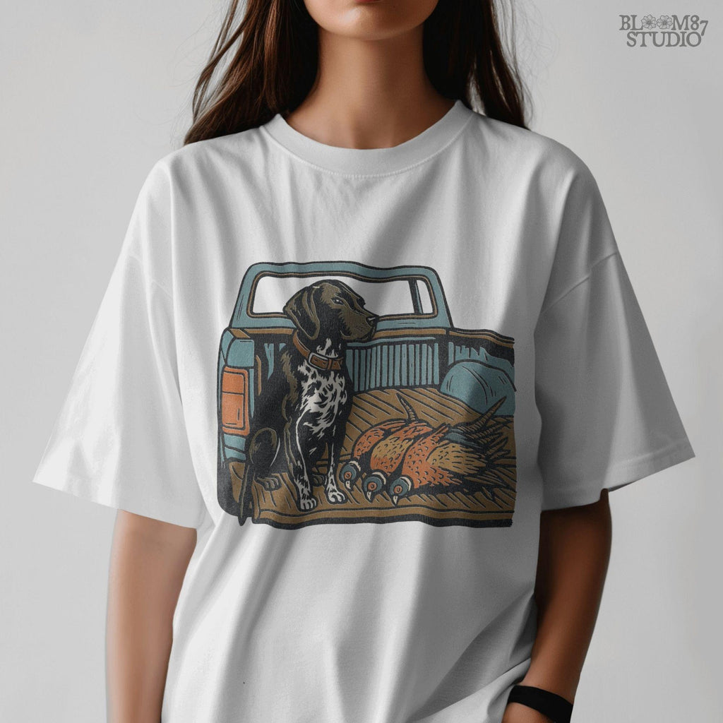 Illustration of a German Shorthaired Pointer hunting dog sitting in a pickup truck with three pheasants, sublimation PNG design.