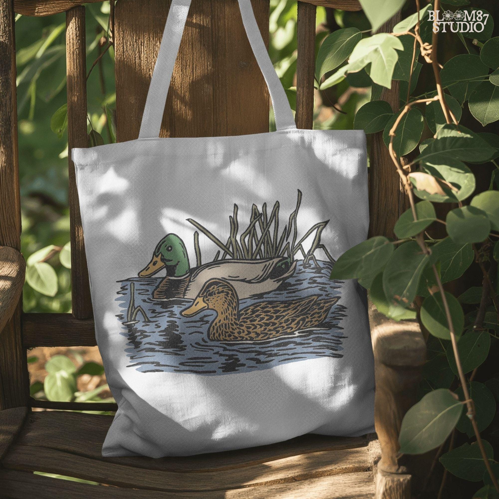 Illustration of a male and female mallard duck swimming in marsh water among reeds, ideal for waterfowl hunting and lodge décor sublimation designs