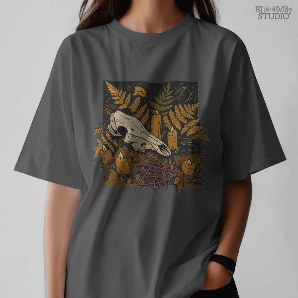 Deer skull surrounded by candles and ferns in a gothic Halloween forest scene, occult spooky sublimation PNG for shirts and decor.
