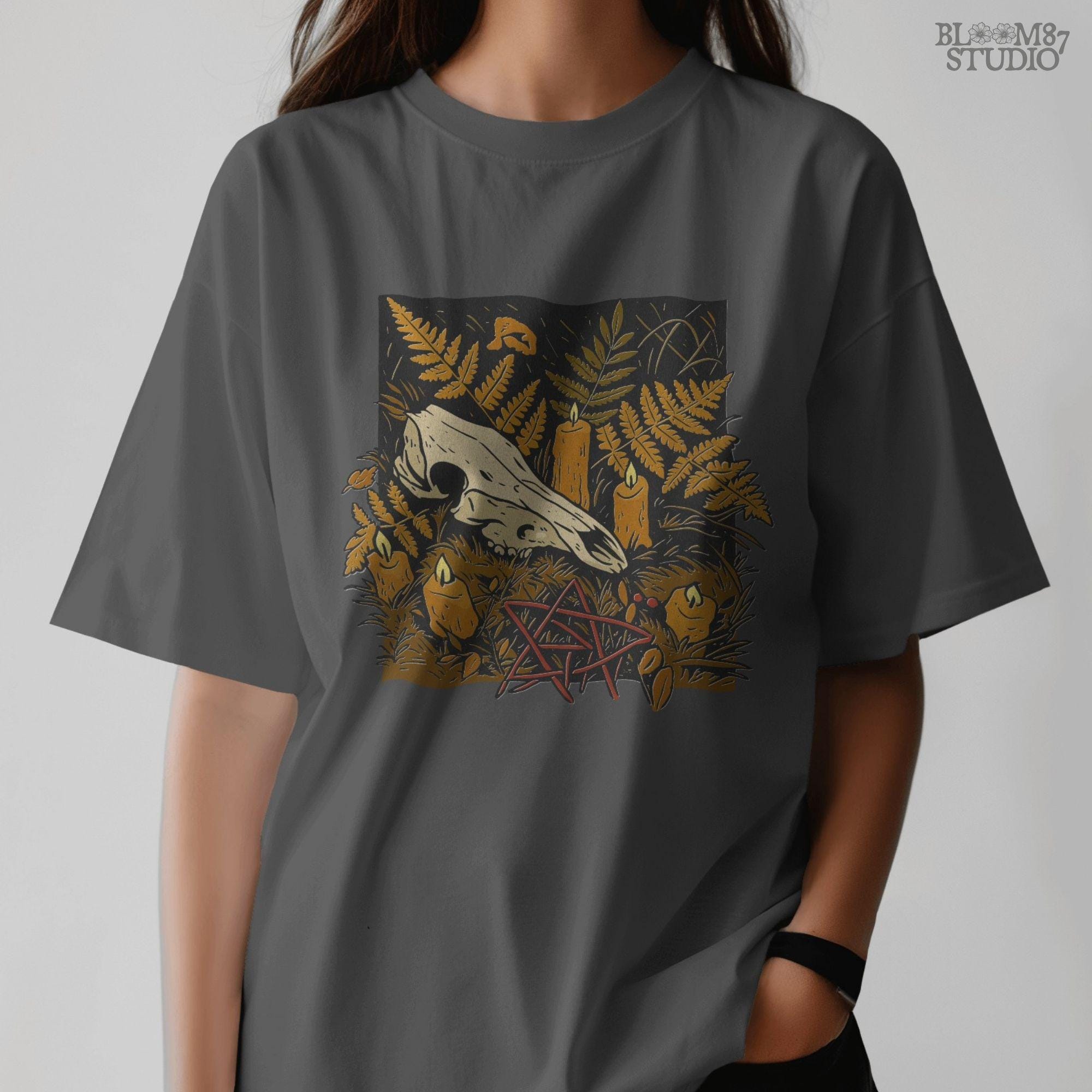 Deer skull surrounded by candles and ferns in a gothic Halloween forest scene, occult spooky sublimation PNG for shirts and decor.