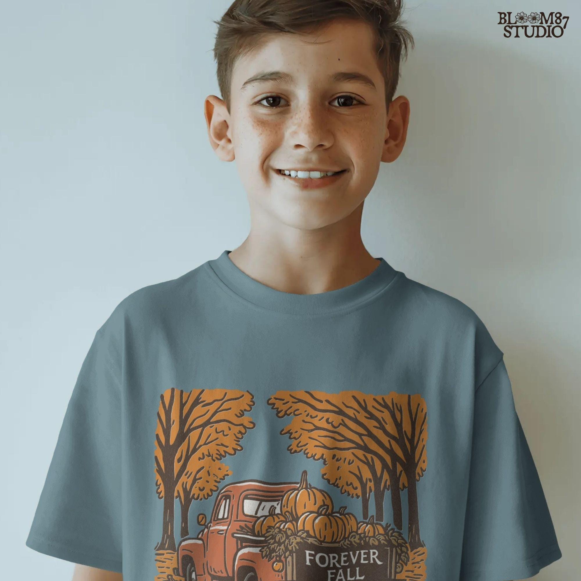 Illustration of a vintage red truck filled with pumpkins and the words “Forever Fall” on the tailgate, surrounded by autumn leaves and trees, sublimation PNG design.