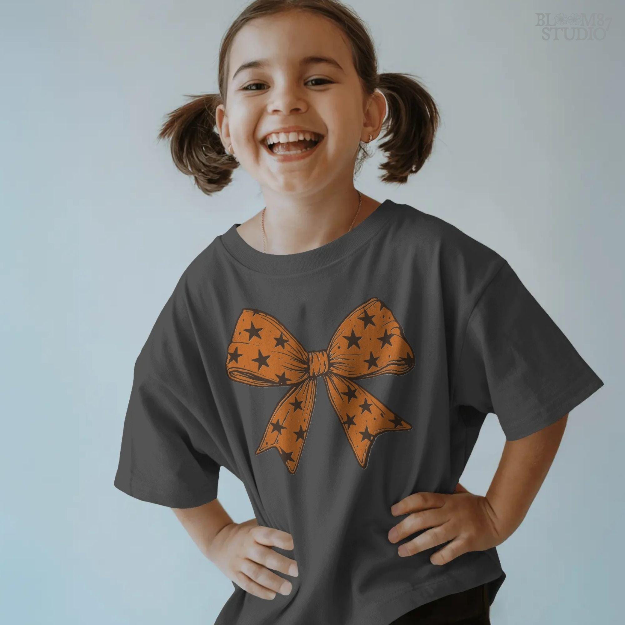 Solid version: "Orange Halloween bow with black star pattern, sublimation PNG ribbon clipart, solid version"

Distressed version: "Halloween bow sublimation PNG with orange star ribbon, vintage distressed textured style"