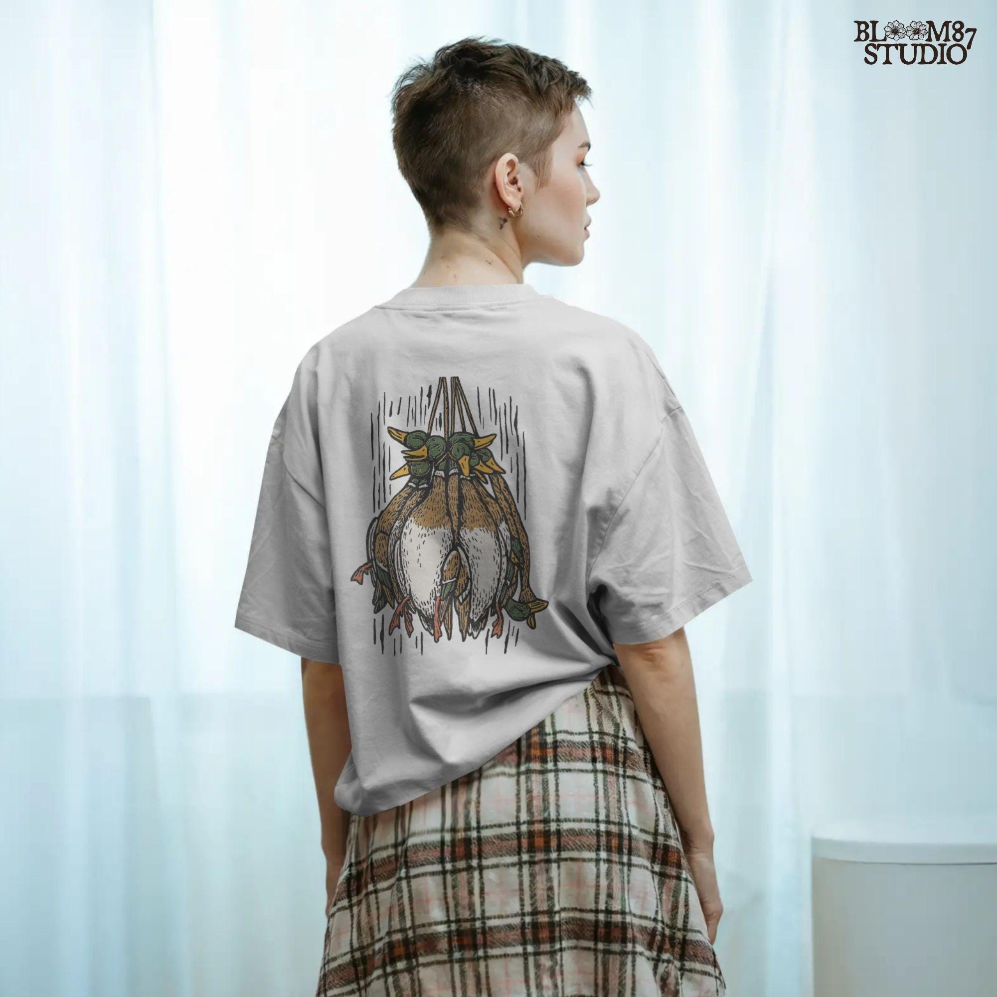 Illustration of harvested mallard ducks hanging together, rustic hunting sublimation PNG design for duck hunters, outdoor gifts, and lodge artwork.