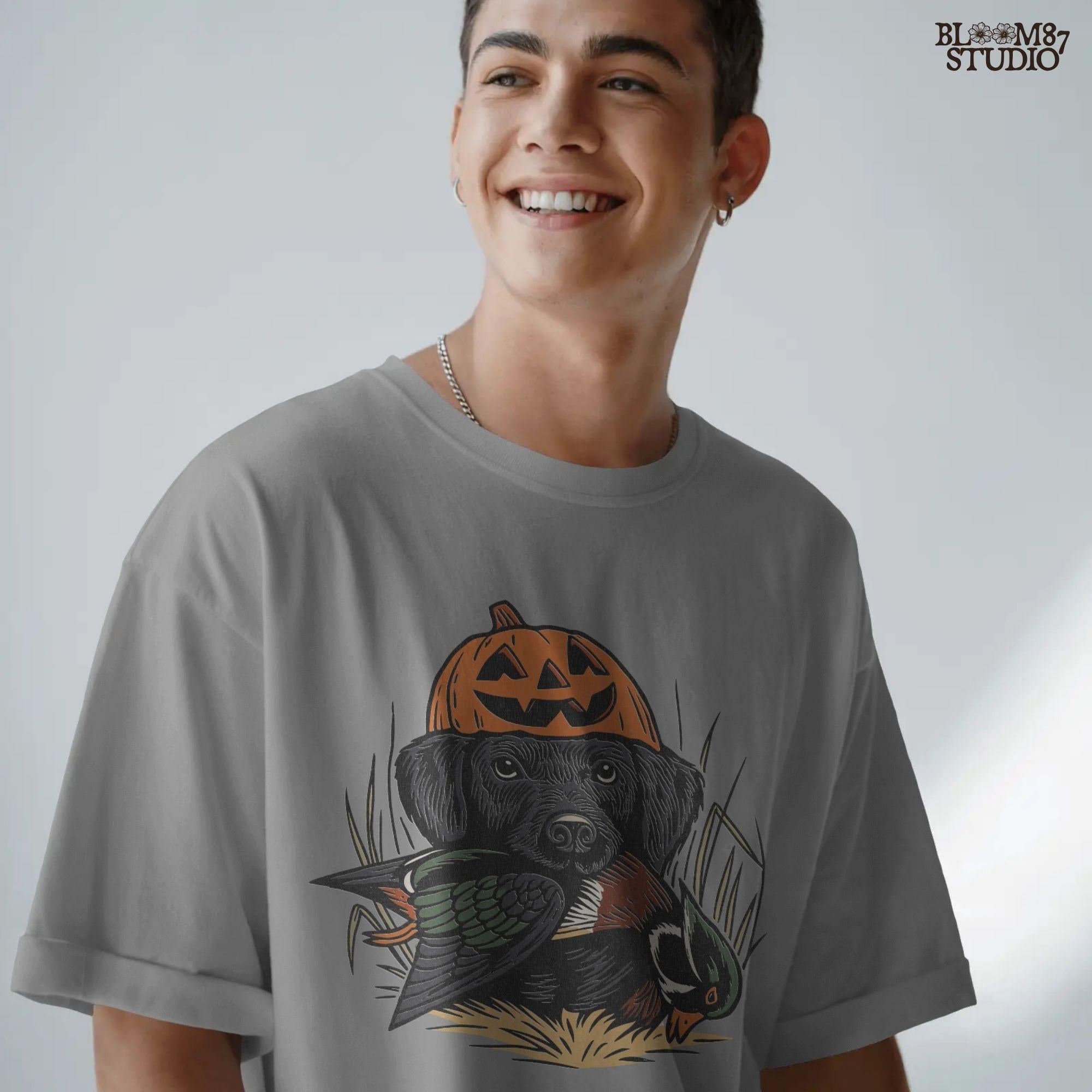 Solid version: "Black Labrador wearing pumpkin jack o lantern hat holding duck, Halloween hunting dog sublimation PNG solid style"

Distressed version: "Halloween hunting dog with pumpkin hat and duck, black lab sublimation PNG vintage distressed version"