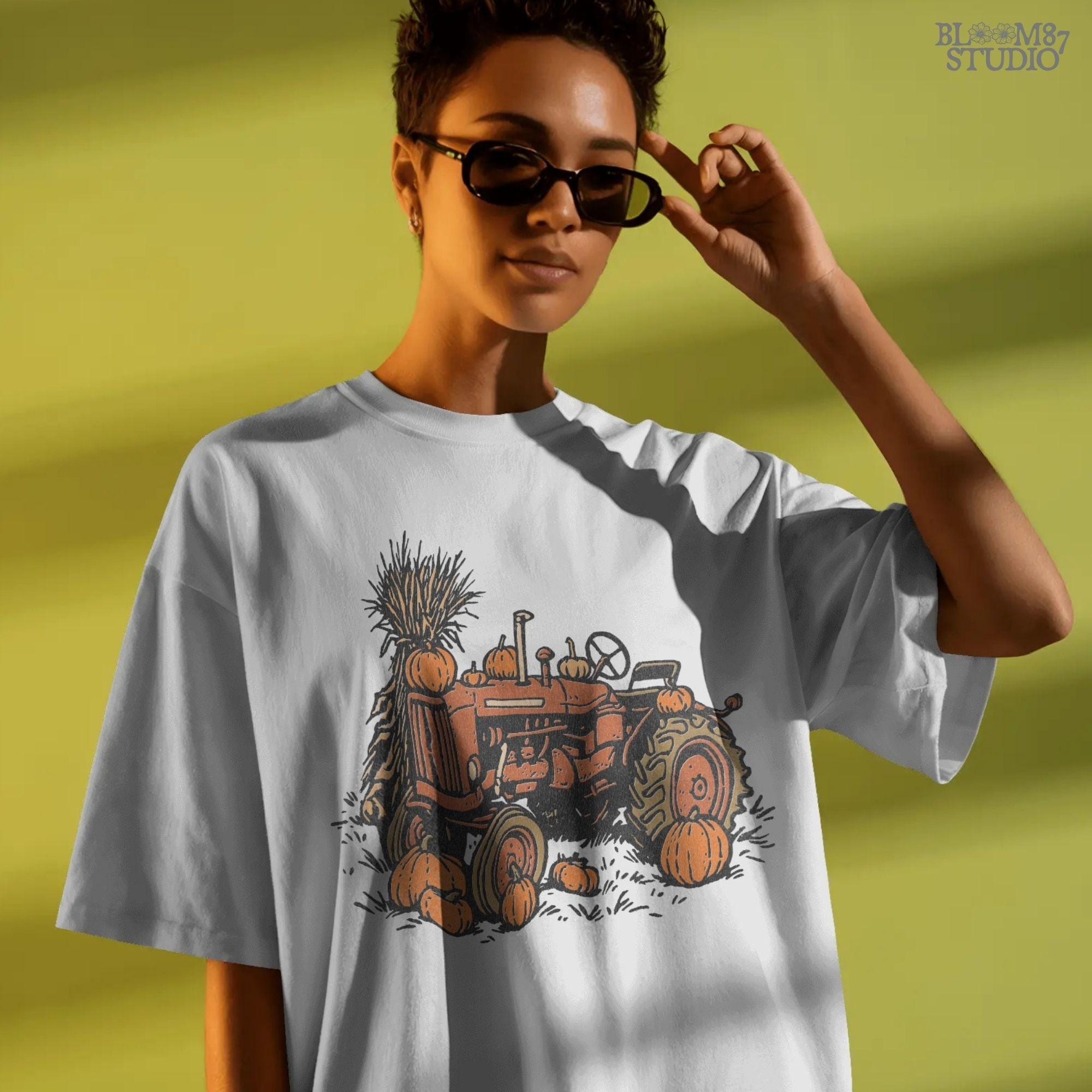 Solid version: "Vintage tractor with pumpkins and harvest décor, fall sublimation PNG design, solid version"

Distressed version: "Rustic fall tractor surrounded by pumpkins, sublimation PNG clipart, vintage distressed style"