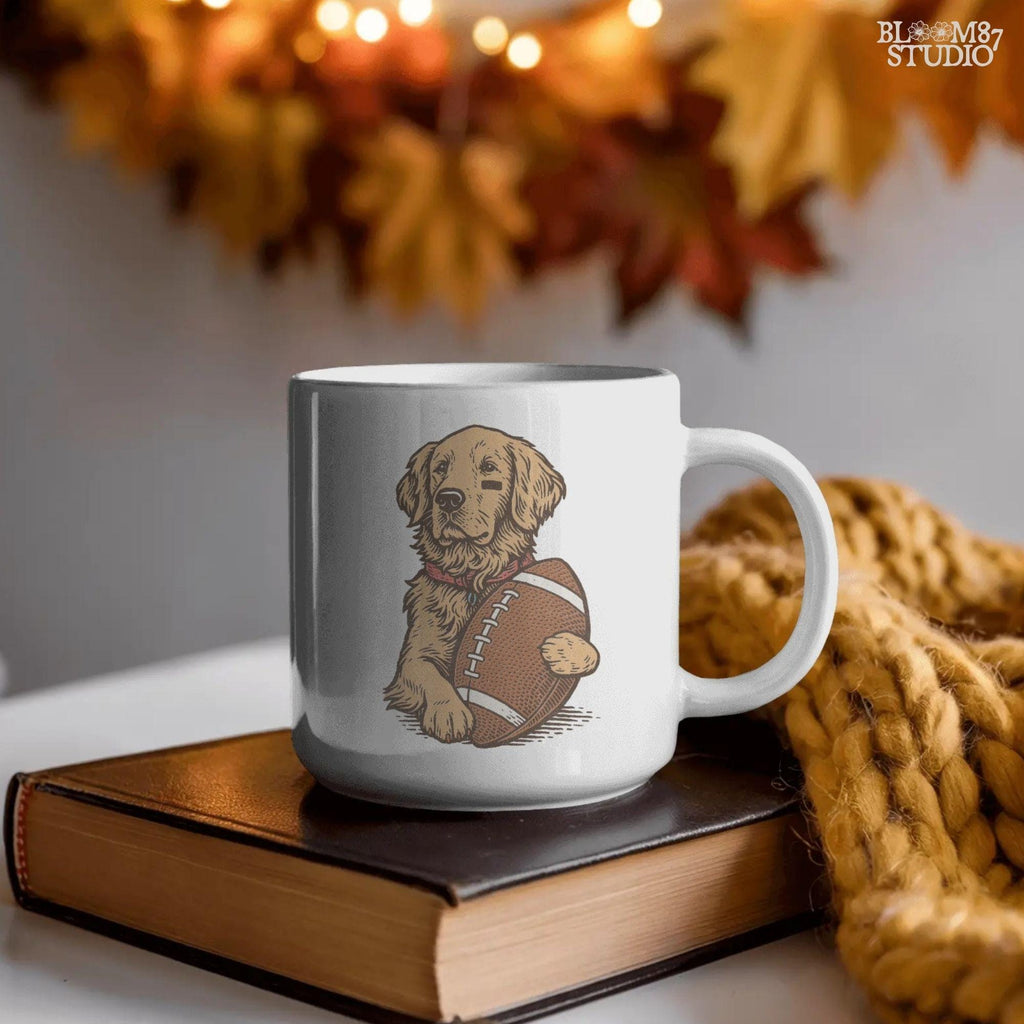 Illustration of a golden retriever holding a football, cute sports dog sublimation PNG for game day shirts, tailgate party designs, and pet lover gifts.