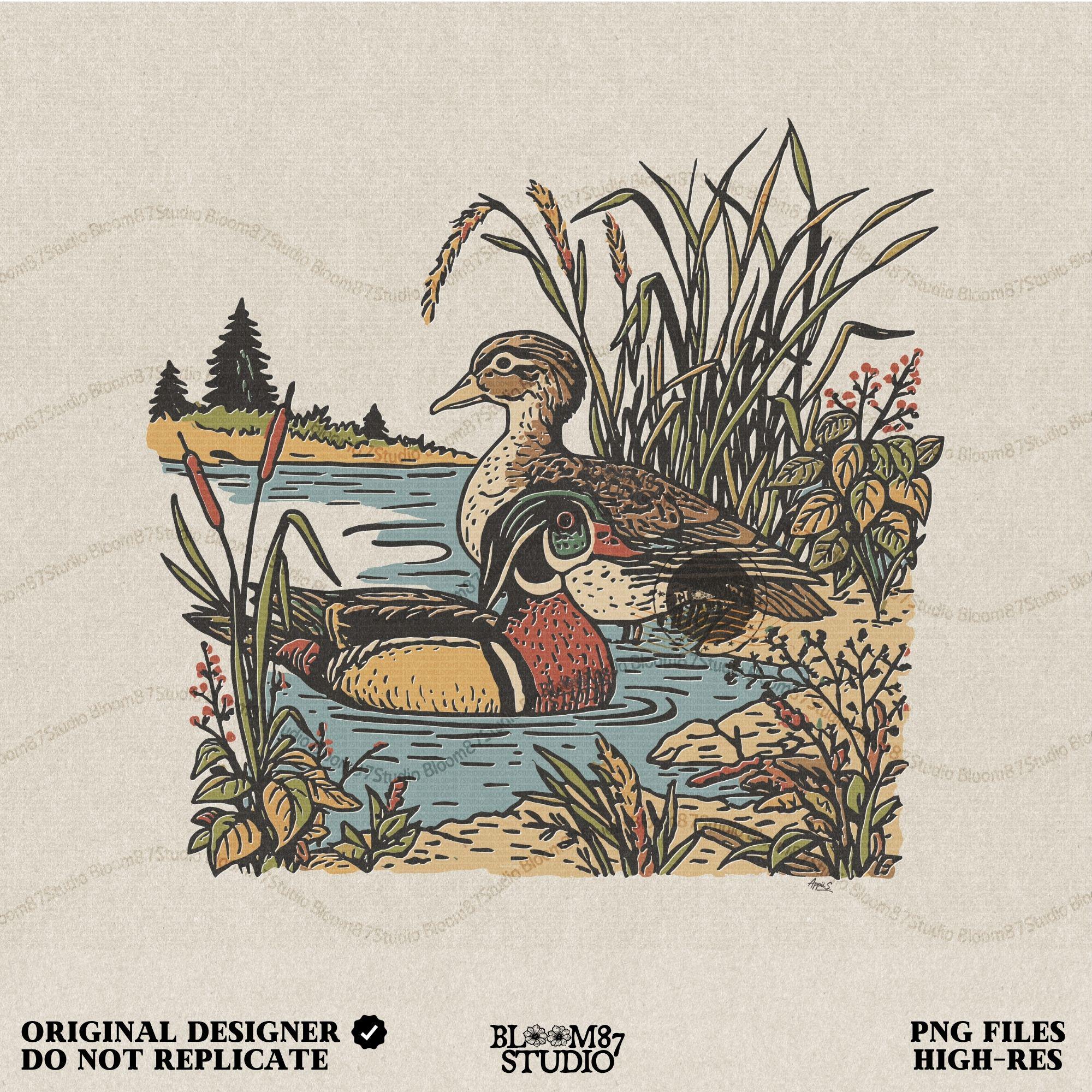 Vintage-style sublimation PNG of two wood ducks in a fall marsh surrounded by cattails and foliage, designed for duck hunting shirts and gifts
