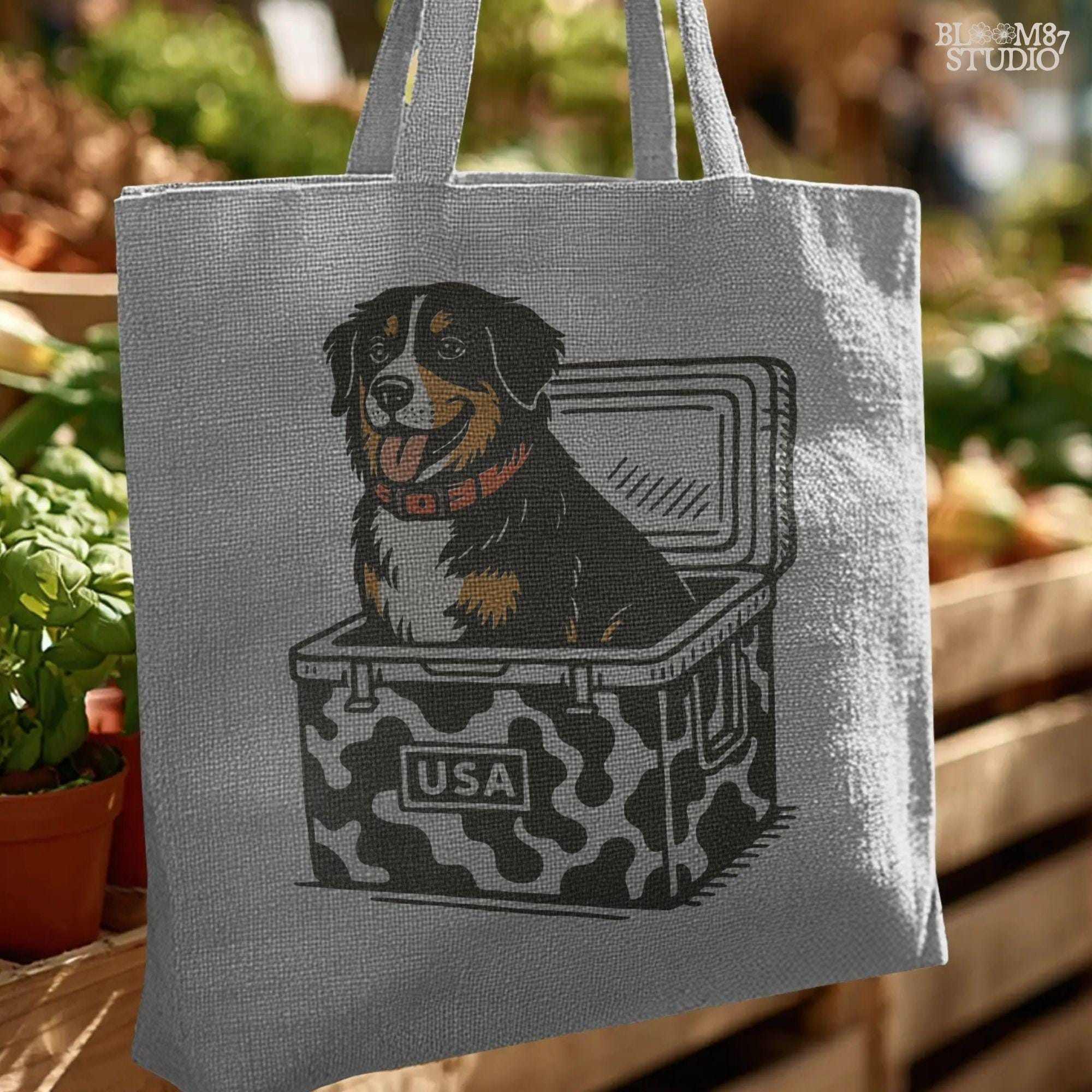Bernese Mountain Dog sitting in a USA camo cooler, sublimation PNG design for hunting, camping, tailgate, and outdoor lifestyle projects.