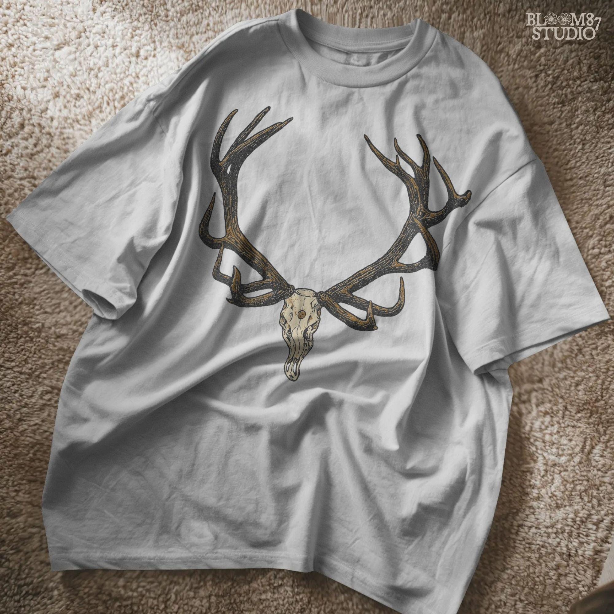 Solid version: "Deer skull sublimation PNG with large antlers rustic hunting lodge wall art solid design"

Distressed version: "Distressed deer skull sublimation PNG with antlers rustic western hunting clipart vintage style"