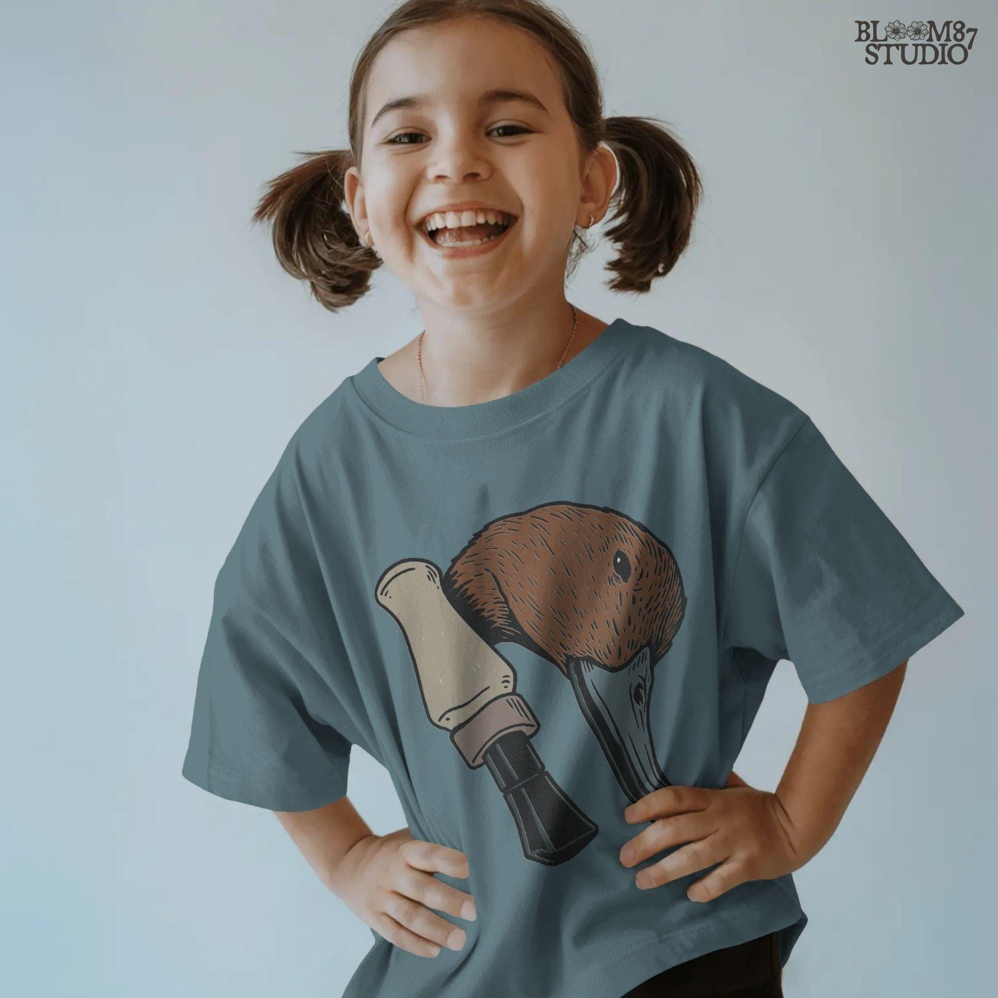 Solid version: "Duck hunting sublimation PNG with rustic mallard head and duck call clipart for outdoorsman shirt design solid style"

Distressed version: "Distressed duck hunting sublimation PNG mallard head with duck call rustic waterfowl clipart for lodge and cabin crafts"