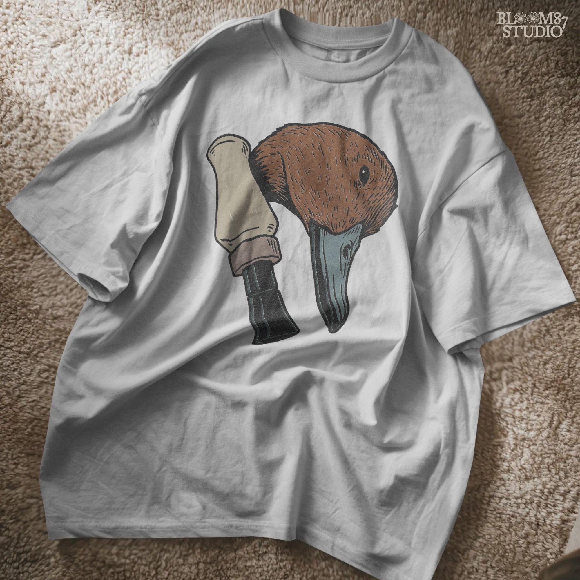 Solid version: "Duck hunting sublimation PNG with rustic mallard head and duck call clipart for outdoorsman shirt design solid style"

Distressed version: "Distressed duck hunting sublimation PNG mallard head with duck call rustic waterfowl clipart for lodge and cabin crafts"