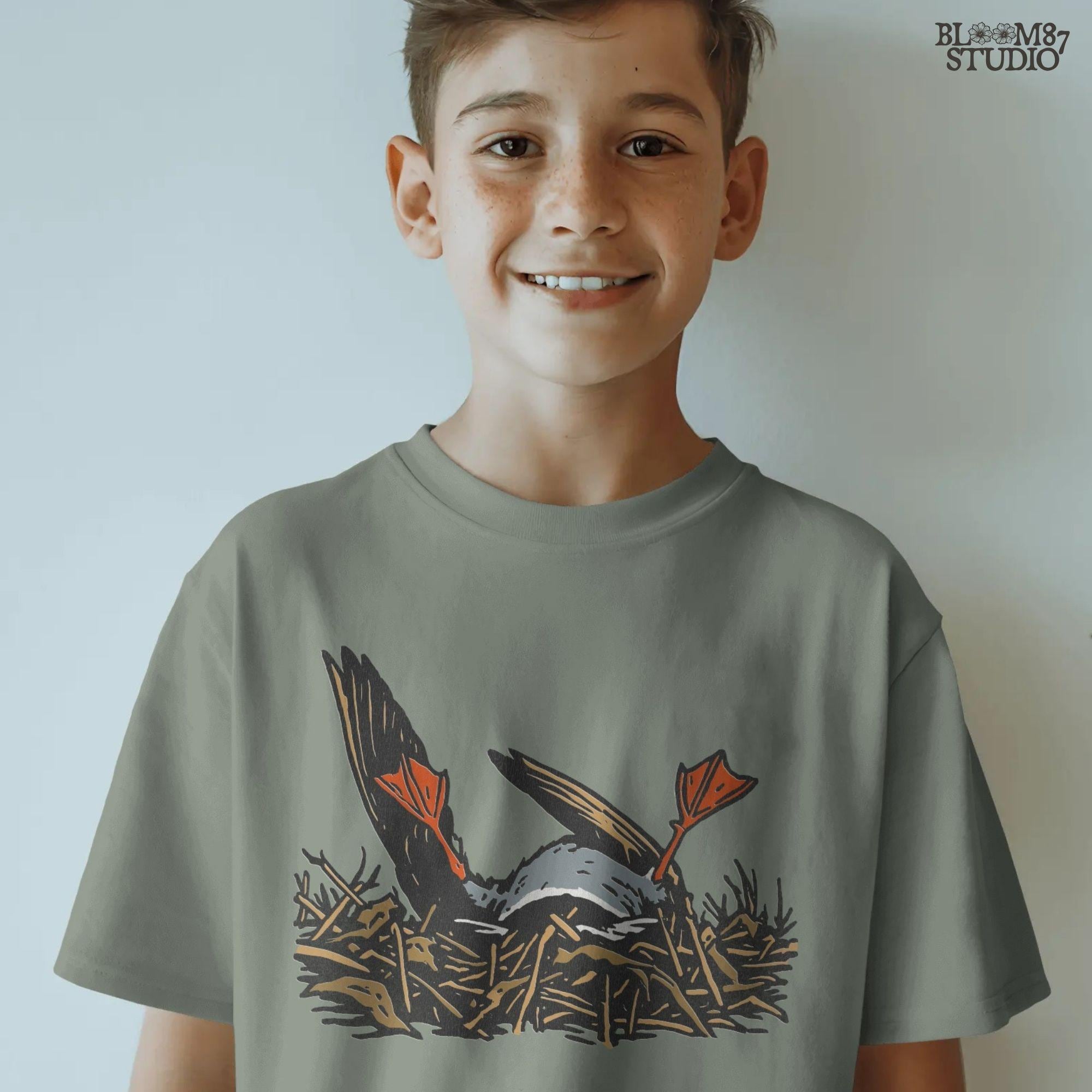 Solid Version:
Cartoon dead duck with orange feet lying in a nest, vintage style sublimation PNG for dark humor Halloween crafts.

Distressed Version:
Distressed-style dead duck illustration in a nest with exaggerated orange feet, ideal for rustic or spooky sublimation designs.