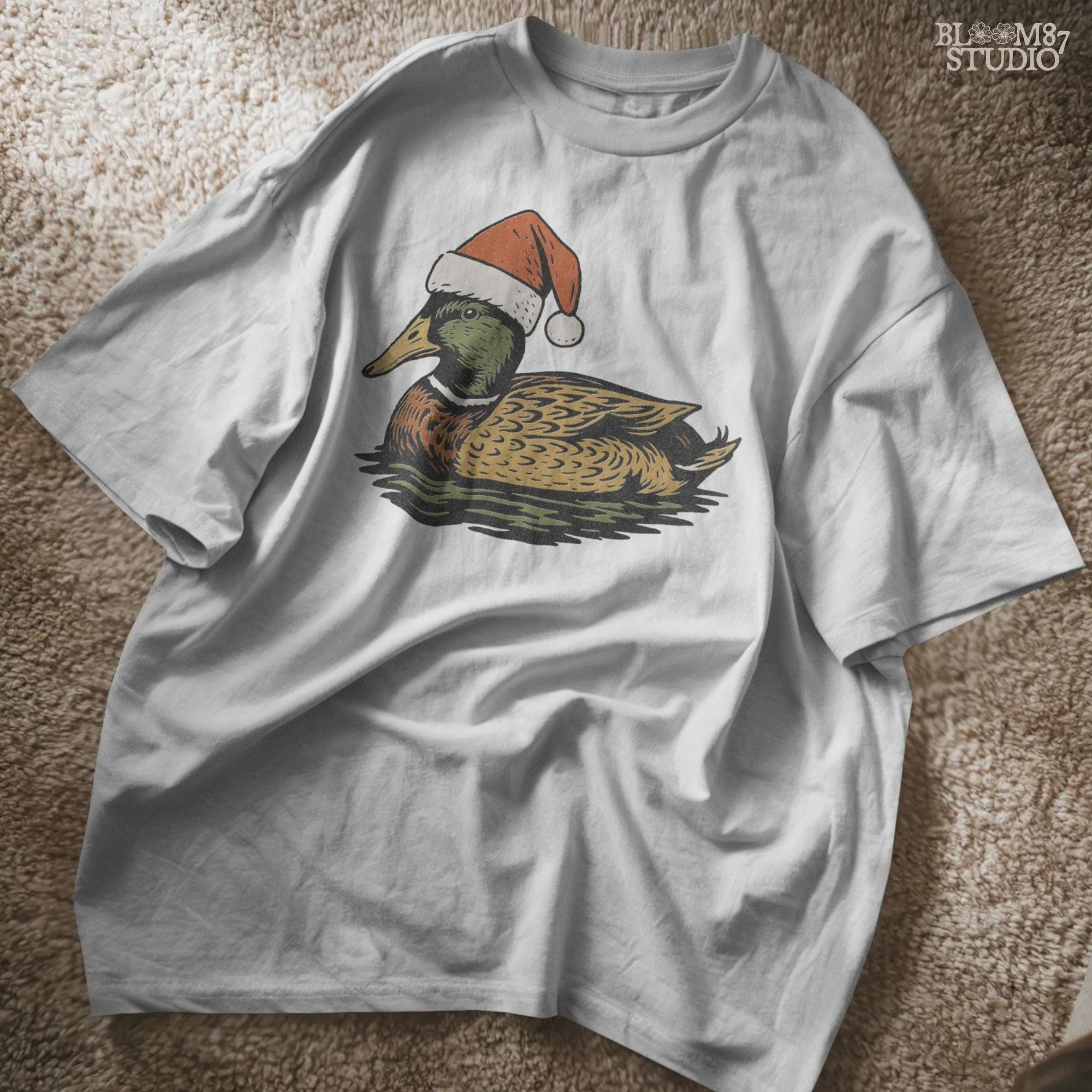 Solid Version:
Vintage illustration of a mallard duck wearing a Santa hat floating on water, sublimation PNG for rustic Christmas crafts and farmhouse holiday decor.

Distressed Version:
Distressed artwork of a festive duck with Santa hat on water, rustic sublimation PNG perfect for farmhouse Christmas shirts, mugs, and seasonal crafts.