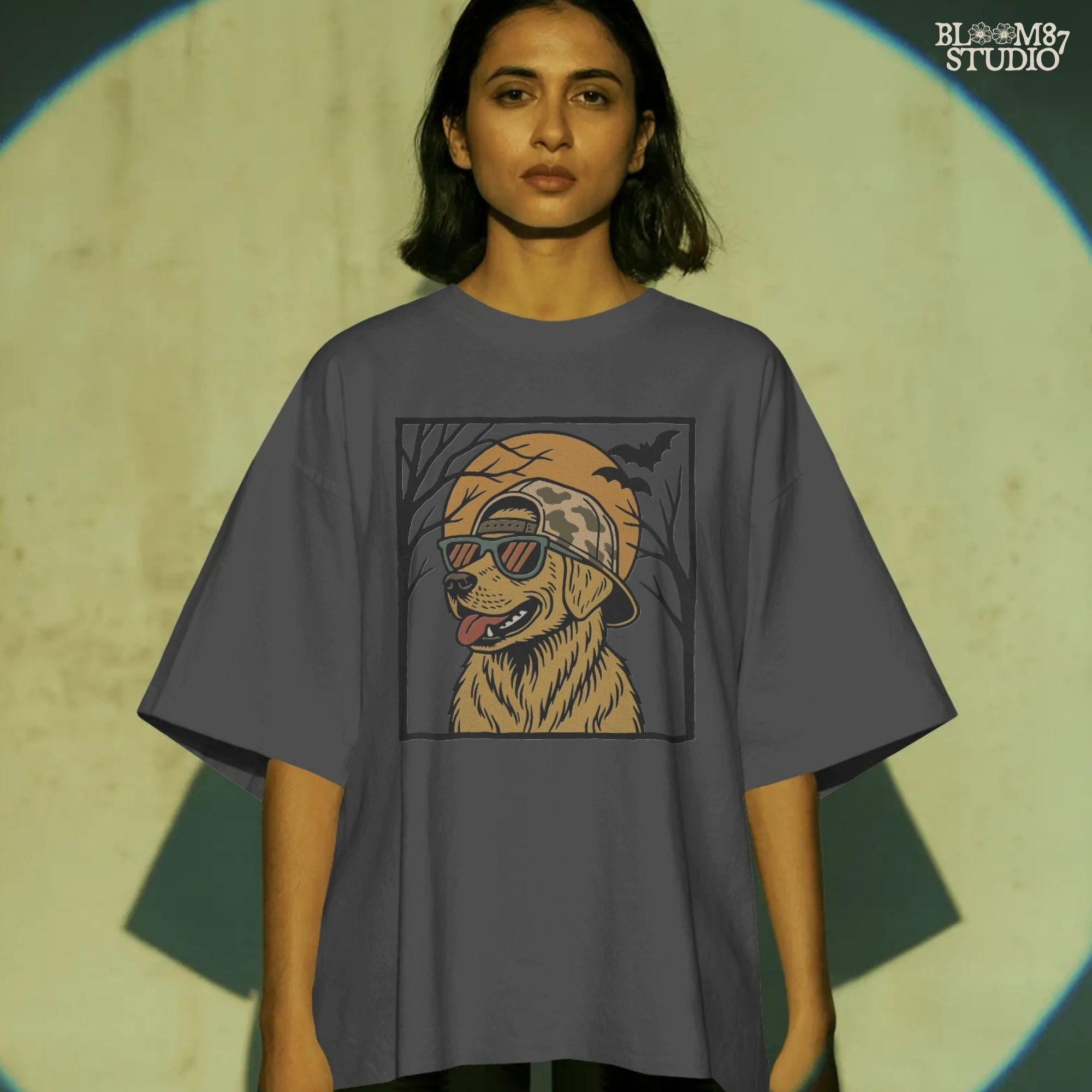 Solid version:
“Golden retriever dog wearing sunglasses and camo hat under full moon with bats – Halloween sublimation PNG design for shirts and crafts”

Distressed version:
“Vintage distressed golden retriever Halloween sublimation PNG of dog in sunglasses and camo hat under moon with bats for spooky designs”