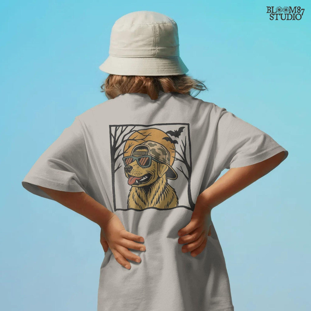 Solid version:
“Golden retriever dog wearing sunglasses and camo hat under full moon with bats – Halloween sublimation PNG design for shirts and crafts”

Distressed version:
“Vintage distressed golden retriever Halloween sublimation PNG of dog in sunglasses and camo hat under moon with bats for spooky designs”