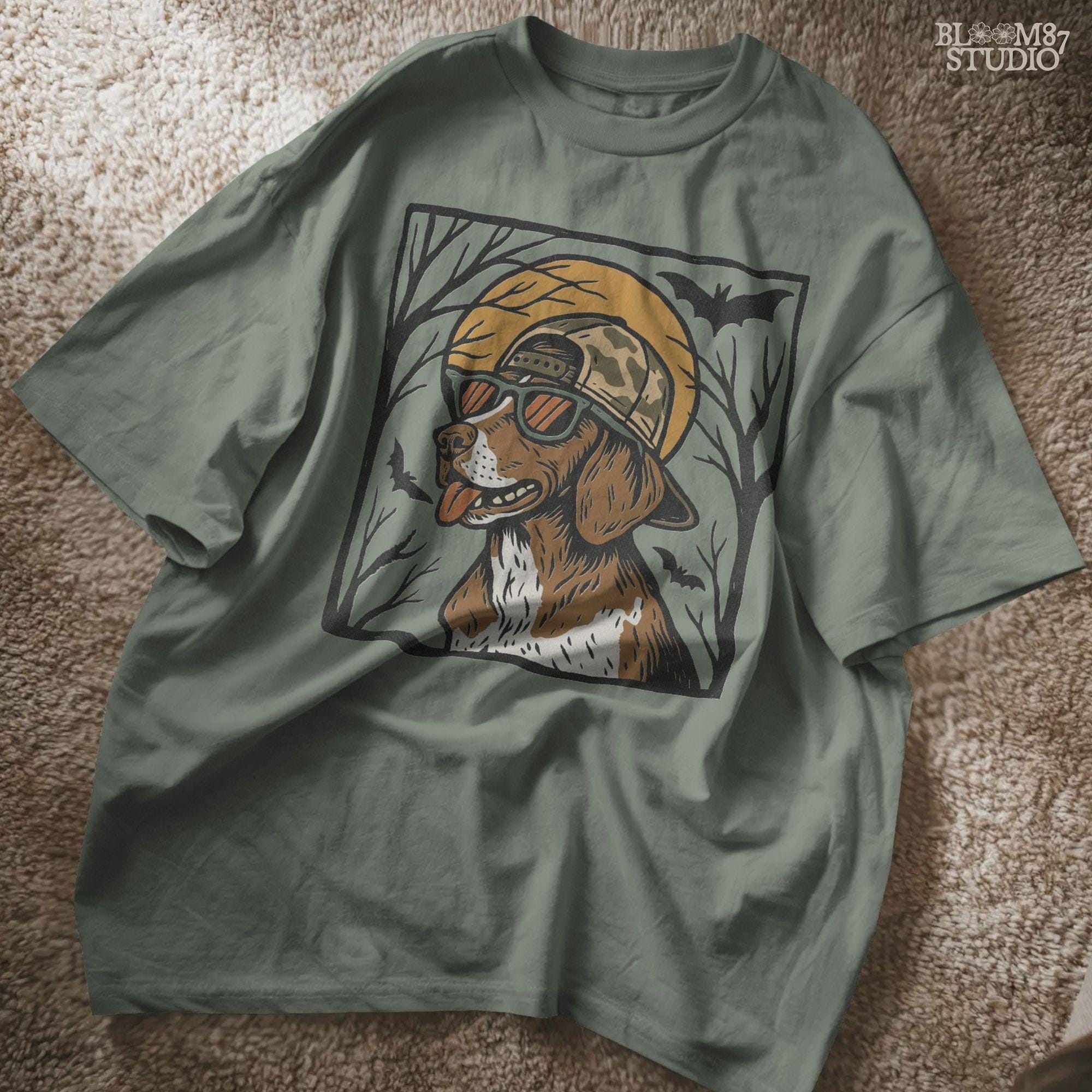 Solid version:
“German Shorthaired Pointer dog wearing sunglasses and camo hat under full moon with bats – Halloween sublimation PNG design”

Distressed version:
“Vintage distressed Halloween sublimation PNG of German Shorthaired Pointer in sunglasses and camo hat under moon with bats”