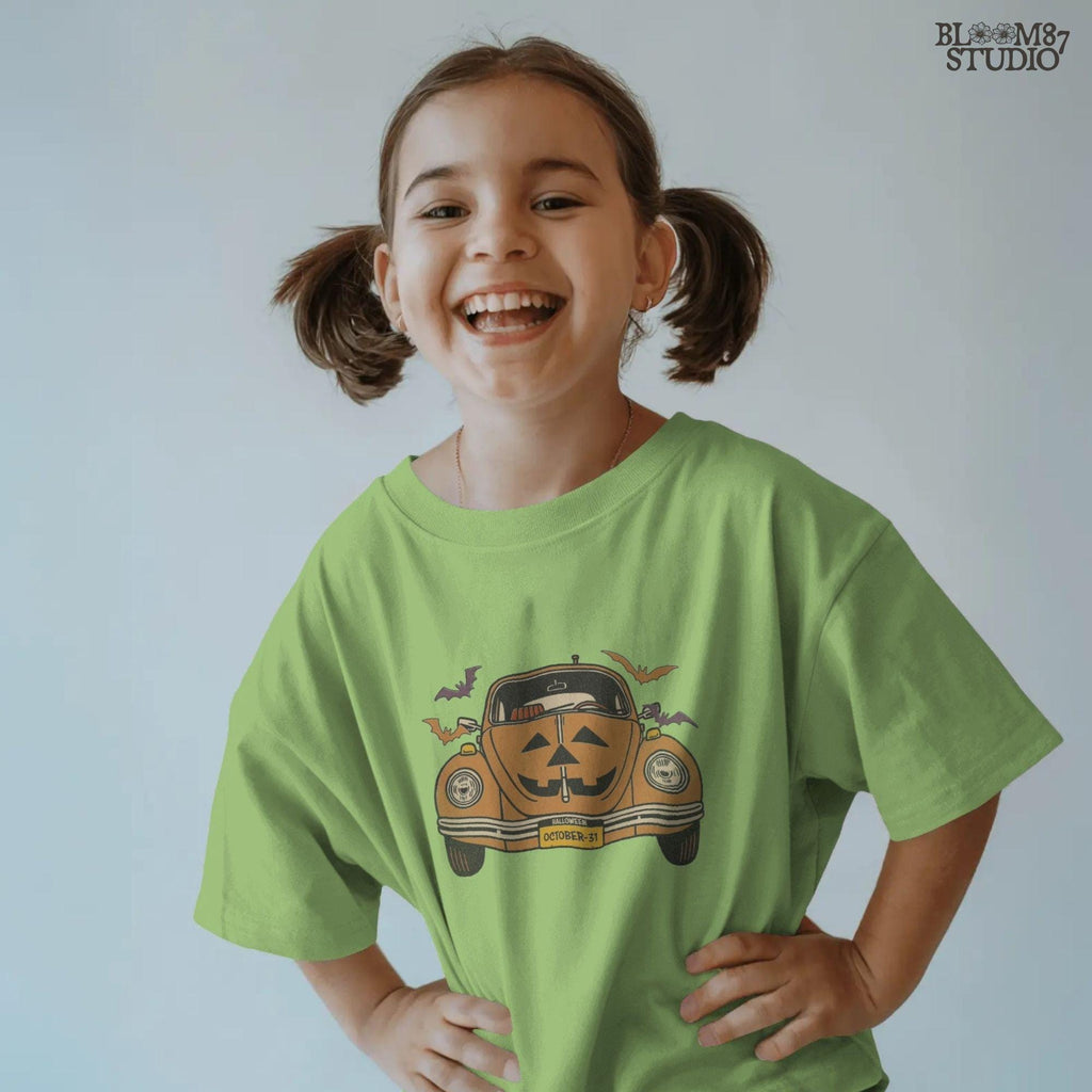 Halloween pumpkin car with Jack O’Lantern face, flying bats, and October 31 theme, retro spooky sublimation PNG design.