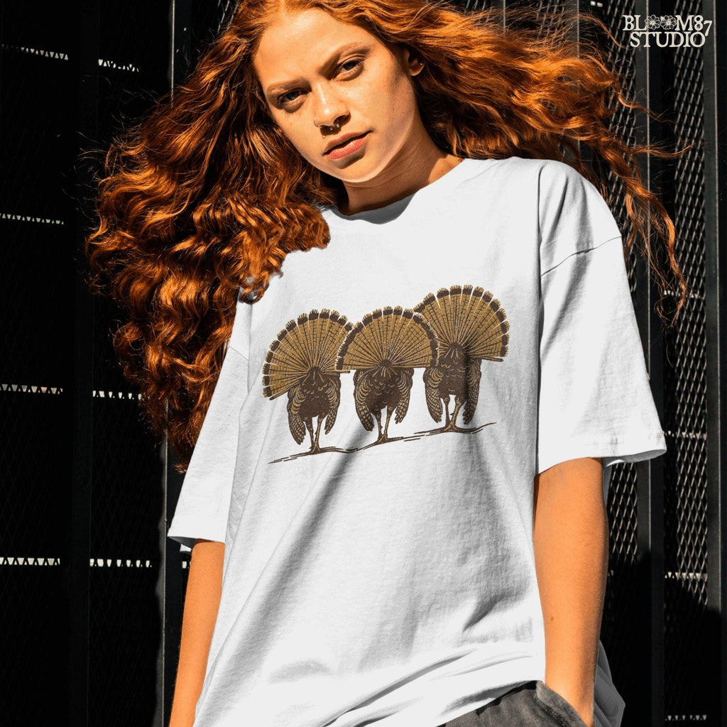 Solid version:
“Three wild turkeys with large tail feathers displayed – rustic turkey sublimation PNG for farmhouse crafts and hunting designs”

Distressed version:
“Vintage distressed turkey sublimation PNG of three wild turkeys with tail feathers fanned out – rustic hunting and farmhouse shirt design”
