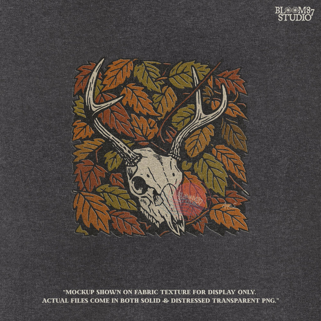 Deer skull with antlers surrounded by autumn leaves, rustic fall hunting sublimation PNG design.