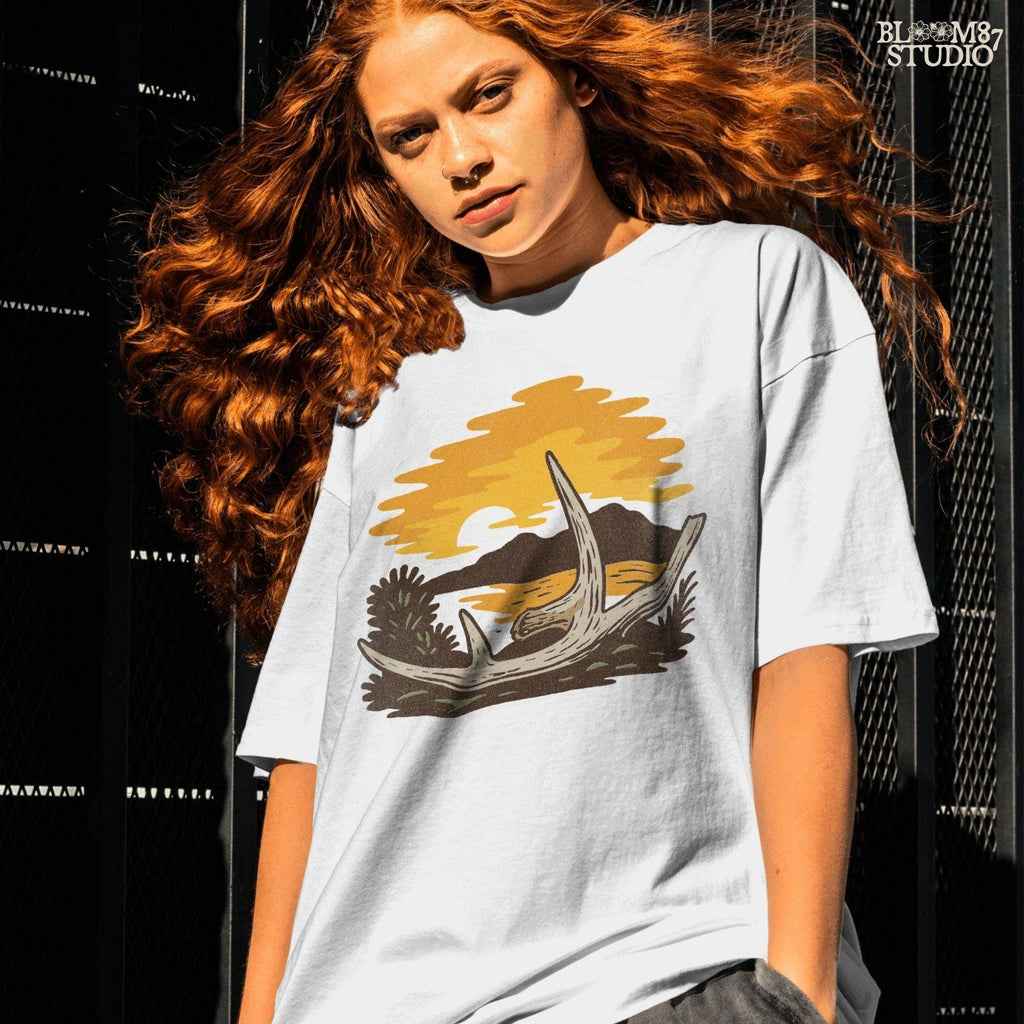 Solid version:
“Deer shed antlers on ground with fall sunset, mountains, and lake – rustic autumn antler sublimation PNG for shirts and crafts”

Distressed version:
“Vintage distressed sublimation PNG of deer shed antlers at autumn sunset by mountains and lake – rustic hunting season design”