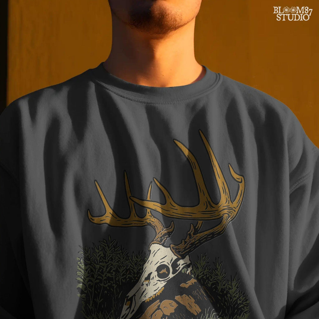 Solid version:
“Deer skull with large antlers resting in grass and rocks – rustic hunting sublimation PNG for crafts and lodge décor”

Distressed version:
“Vintage distressed sublimation PNG of deer skull with antlers in grass – rustic hunting and outdoor lodge shirt design”