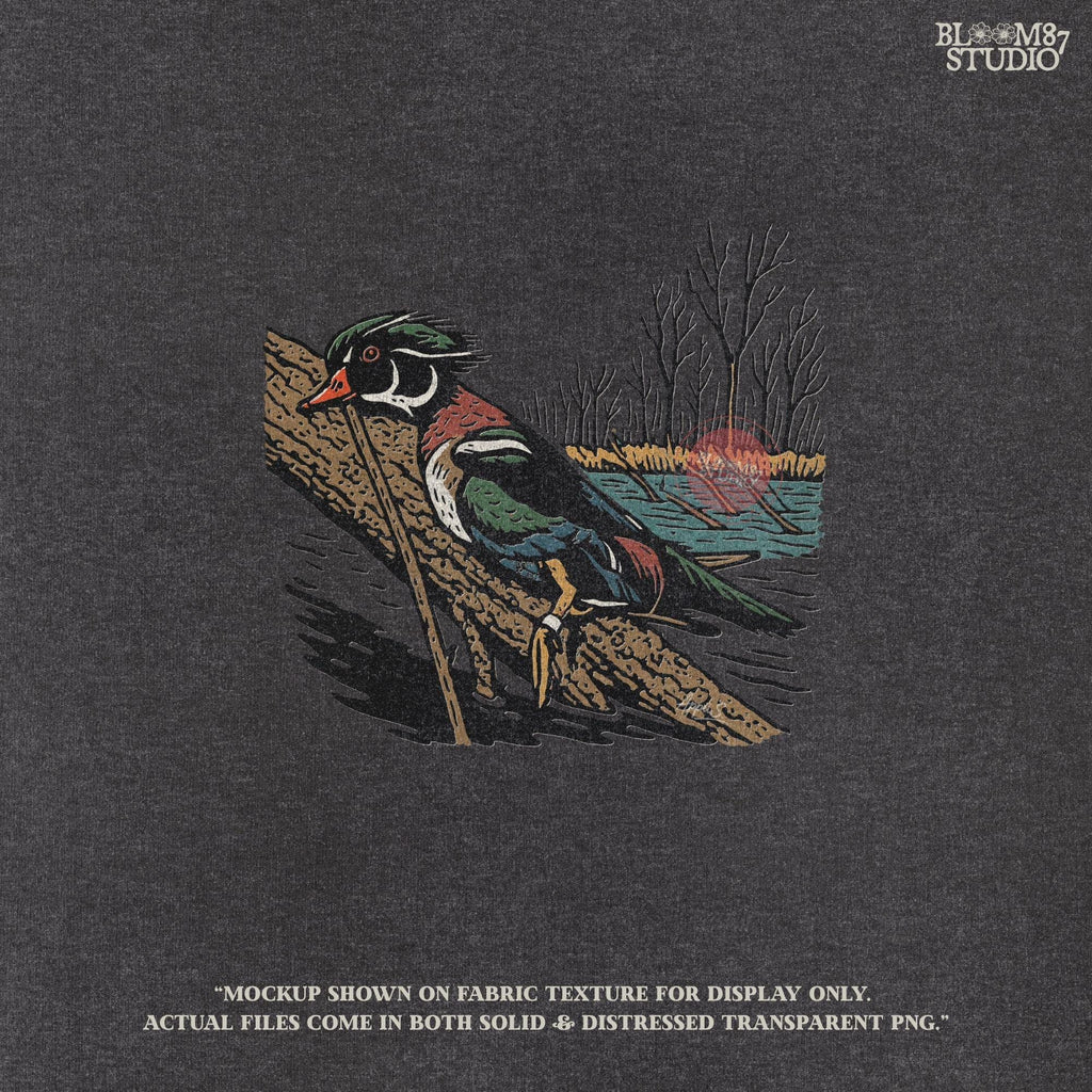 Solid version:
“Colorful wood duck perched on tree branch by lake with trees – waterfowl sublimation PNG for hunting and outdoor crafts”

Distressed version:
“Vintage distressed sublimation PNG of wood duck on branch by lake and trees – rustic hunting and lodge décor design”