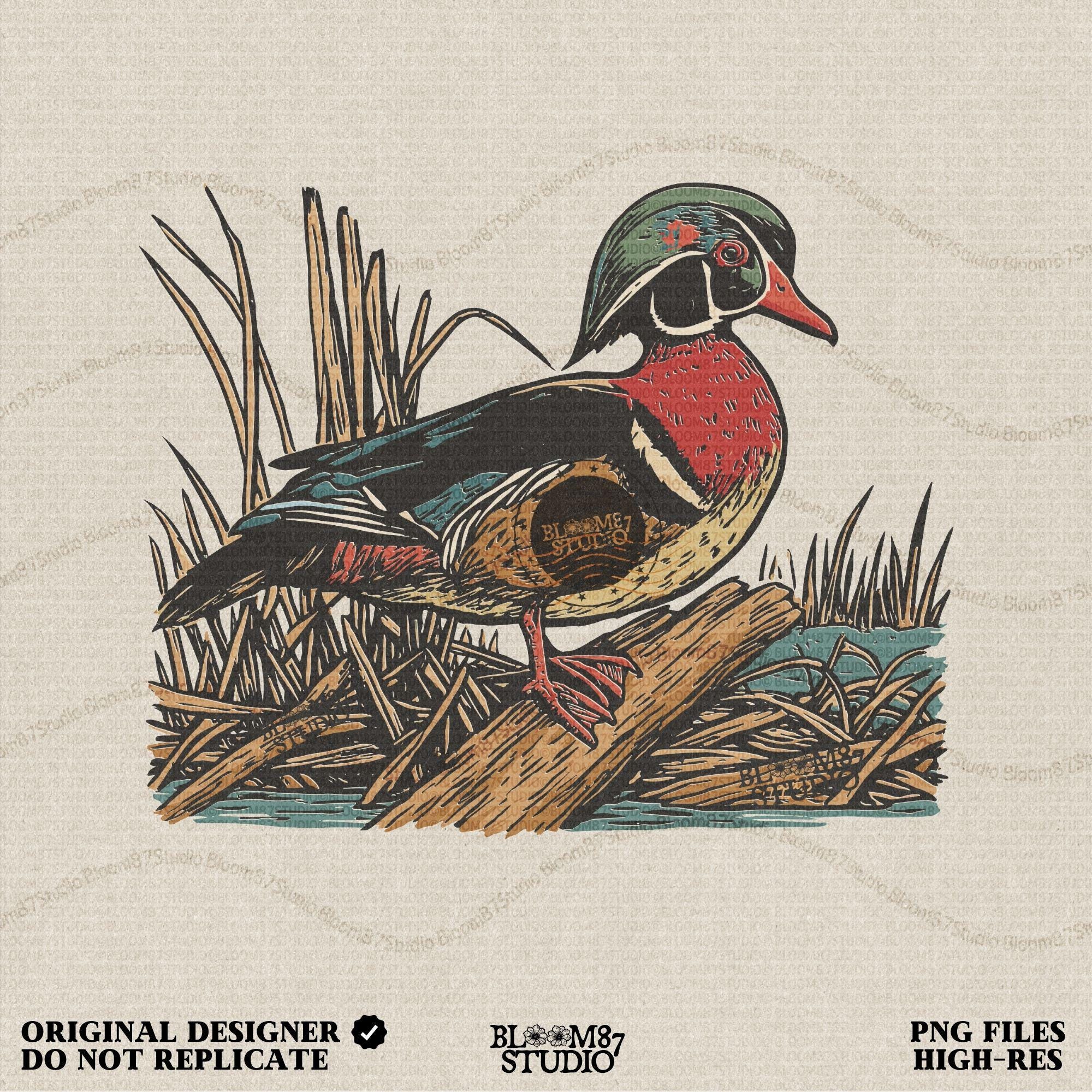 Solid version:
“Wood duck perched on log with marsh grass background – waterfowl sublimation PNG for hunting shirts and rustic cabin crafts”

Distressed version:
“Vintage distressed sublimation PNG of wood duck on log with marsh grass – rustic hunting and fall outdoor craft design”