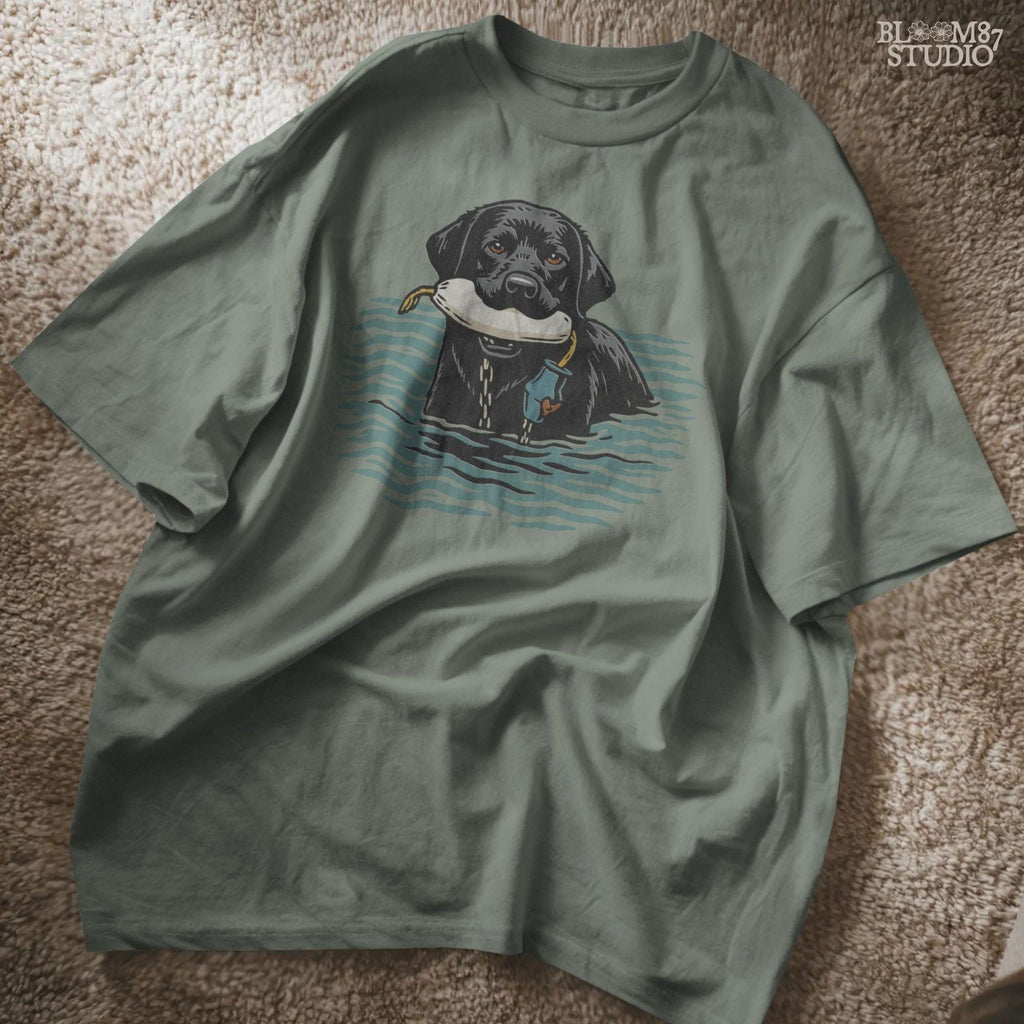 Solid version:
“Black lab retriever swimming in water holding training bumper – hunting dog sublimation PNG for shirts and outdoor crafts”

Distressed version:
“Vintage distressed sublimation PNG of black lab hunting retriever with bumper in water – rustic outdoor and hunting shirt design”