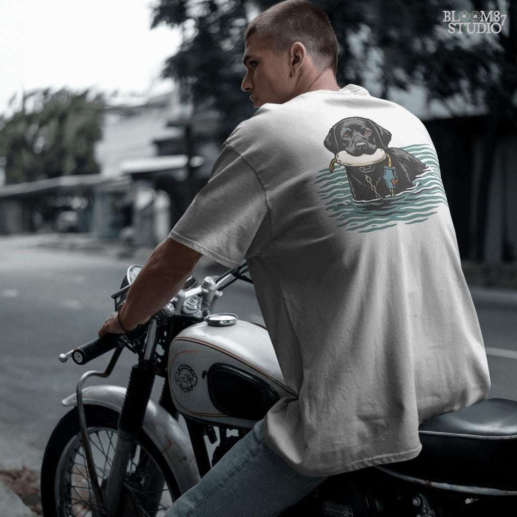 Solid version:
“Black lab retriever swimming in water holding training bumper – hunting dog sublimation PNG for shirts and outdoor crafts”

Distressed version:
“Vintage distressed sublimation PNG of black lab hunting retriever with bumper in water – rustic outdoor and hunting shirt design”