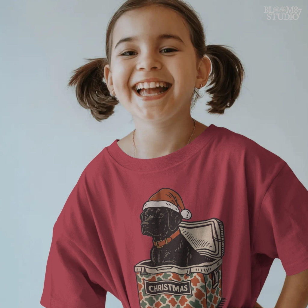 Solid version:
“Black lab dog wearing Santa hat sitting inside Christmas cooler box – holiday sublimation PNG for festive crafts and pet lover gifts”

Distressed version:
“Vintage distressed PNG of black lab with Santa hat in Christmas cooler – festive sublimation design for winter crafts and décor”