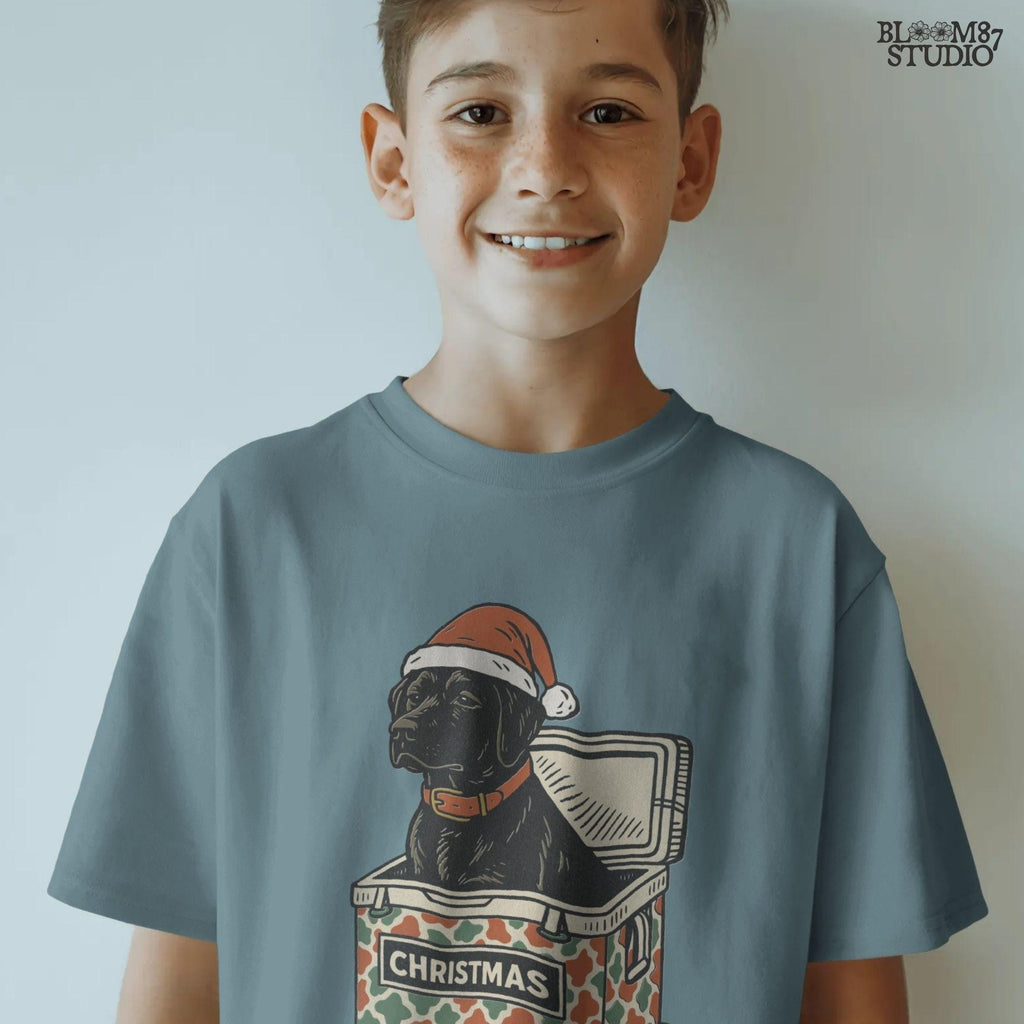 Solid version:
“Black lab dog wearing Santa hat sitting inside Christmas cooler box – holiday sublimation PNG for festive crafts and pet lover gifts”

Distressed version:
“Vintage distressed PNG of black lab with Santa hat in Christmas cooler – festive sublimation design for winter crafts and décor”