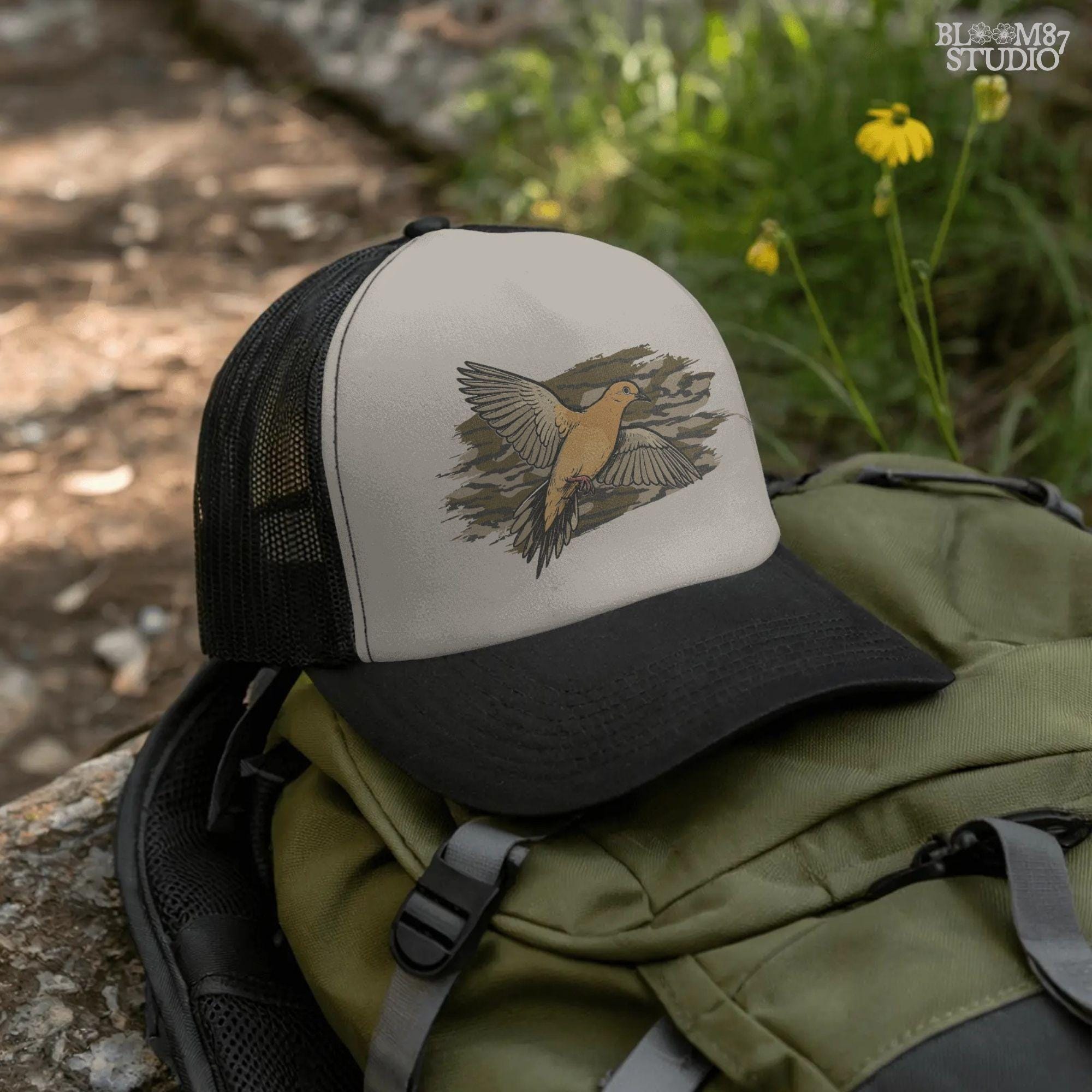 Solid version: Illustration of a mourning dove flying with wings spread, set against a camouflage background, hunting sublimation PNG.
Distressed version: Vintage mourning dove in flight with camo background, rustic distressed hunting PNG for outdoor crafts.