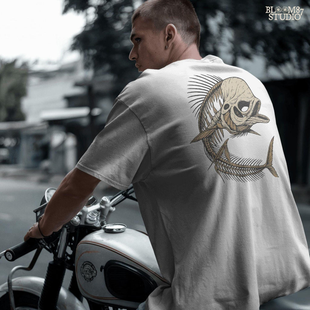 Solid version: Illustration of a spooky fish skeleton with skull head, Halloween creepy PNG design.
Distressed version: Vintage distressed skeleton fish with skull face and spiky bones, gothic Halloween PNG.