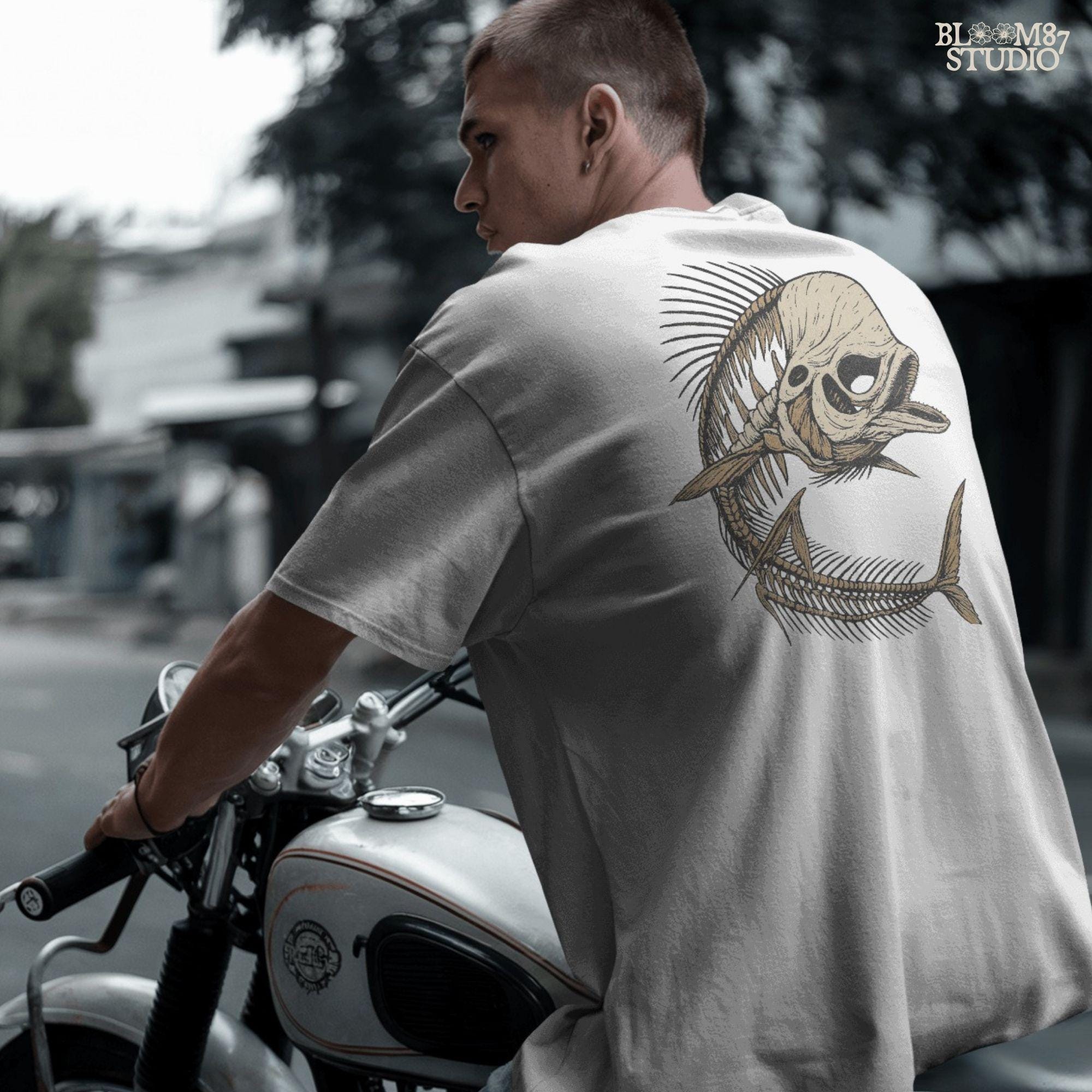 Solid version: Illustration of a spooky fish skeleton with skull head, Halloween creepy PNG design.
Distressed version: Vintage distressed skeleton fish with skull face and spiky bones, gothic Halloween PNG.