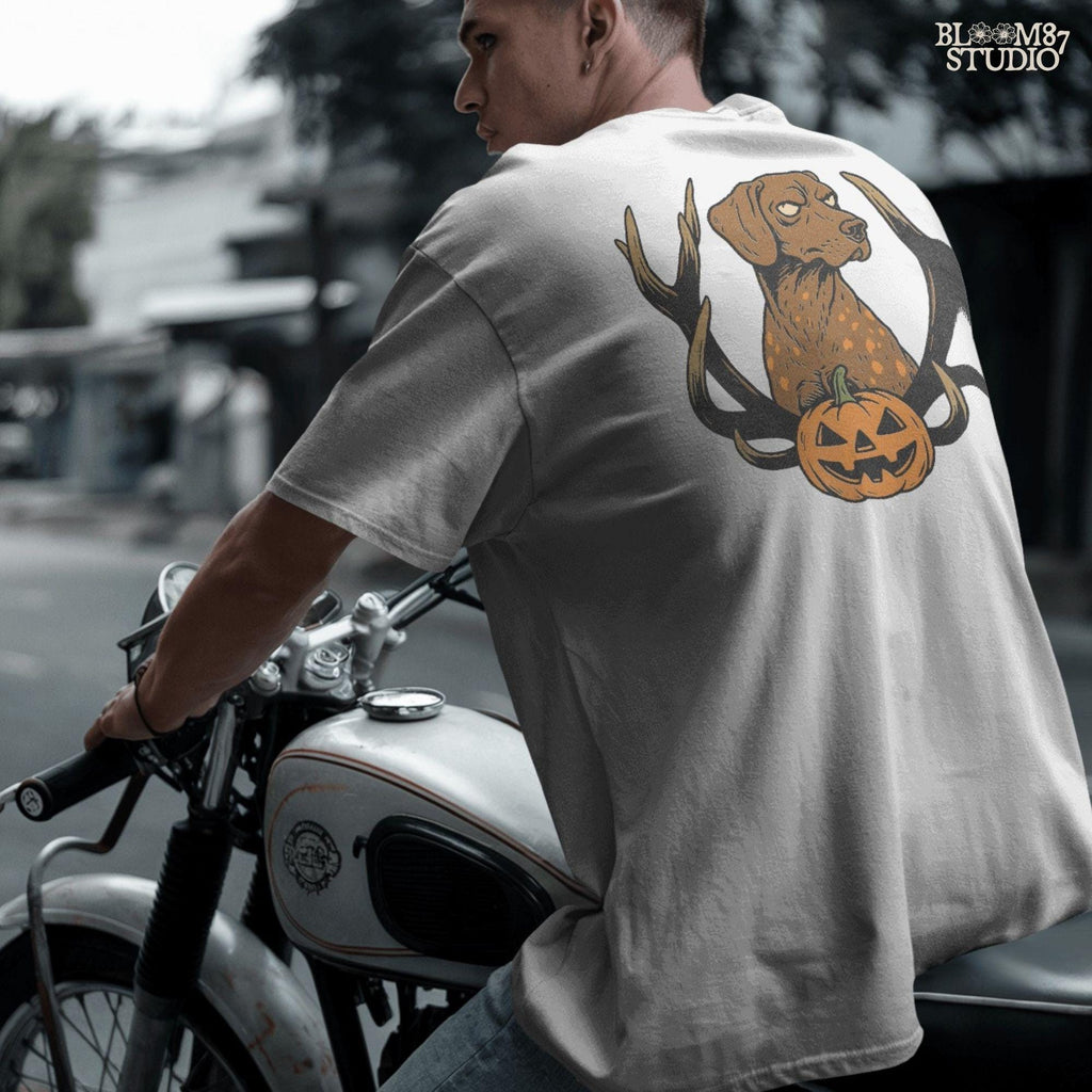 Solid version: Halloween dog PNG with antlers and pumpkin, spooky hunting dog digital download.

Distressed version: Vintage Halloween dog PNG with antlers and jack-o’-lantern, rustic hunting sublimation design.